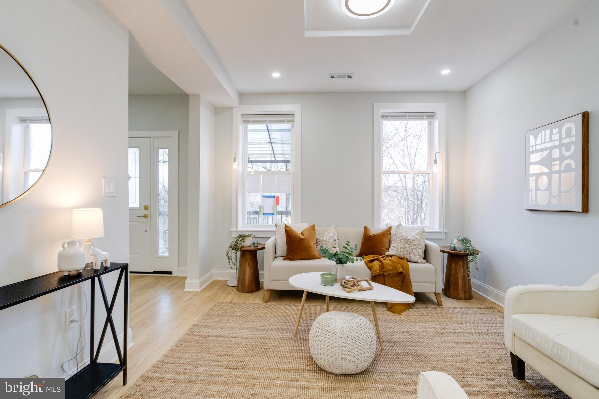 635 North Rosedale Street Baltimore, MD 21216 - Photo 18 of 64 a living room with furniture and a wooden floor