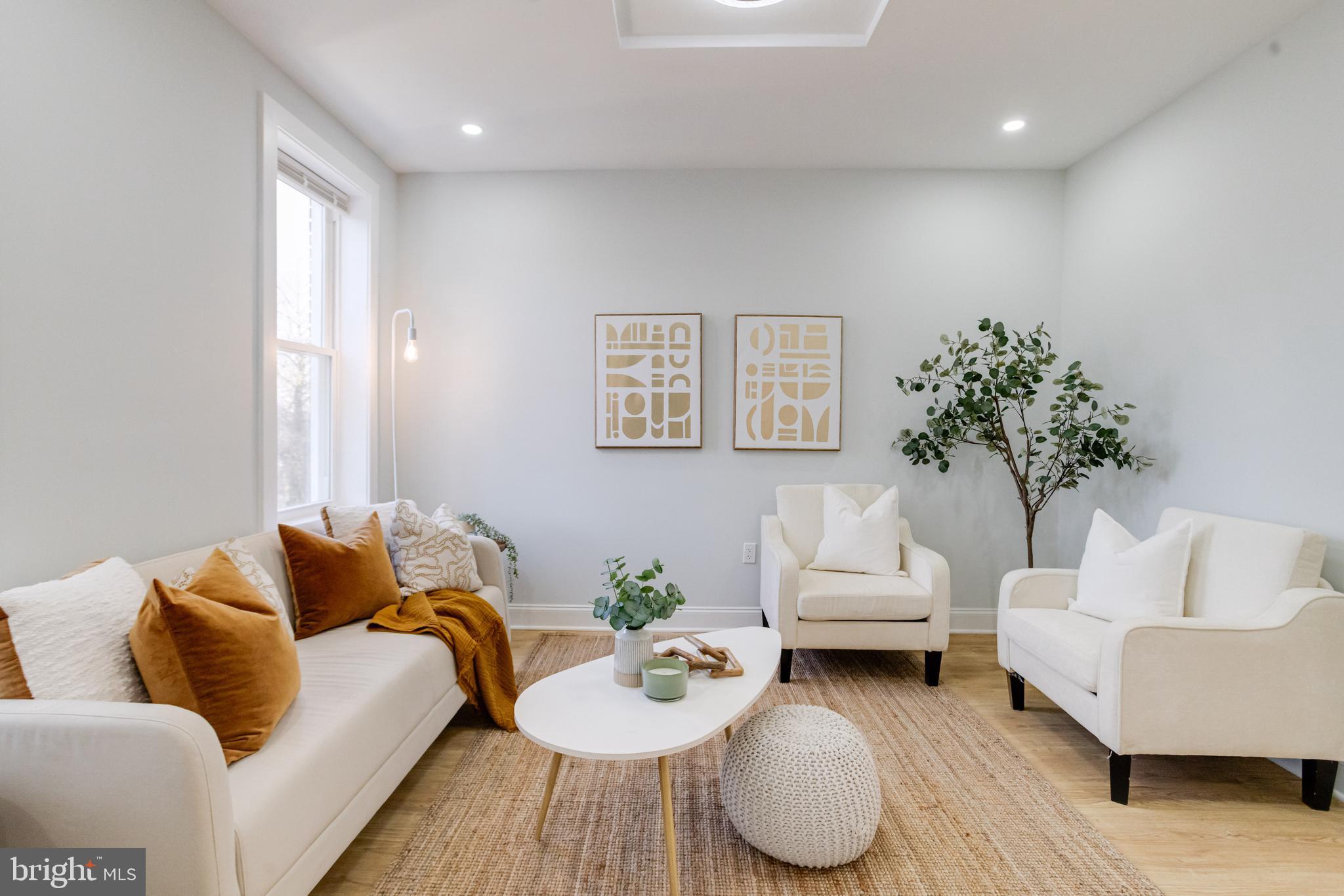 635 North Rosedale Street Baltimore, MD 21216 - Photo 20 of 64 a living room with furniture and a couch