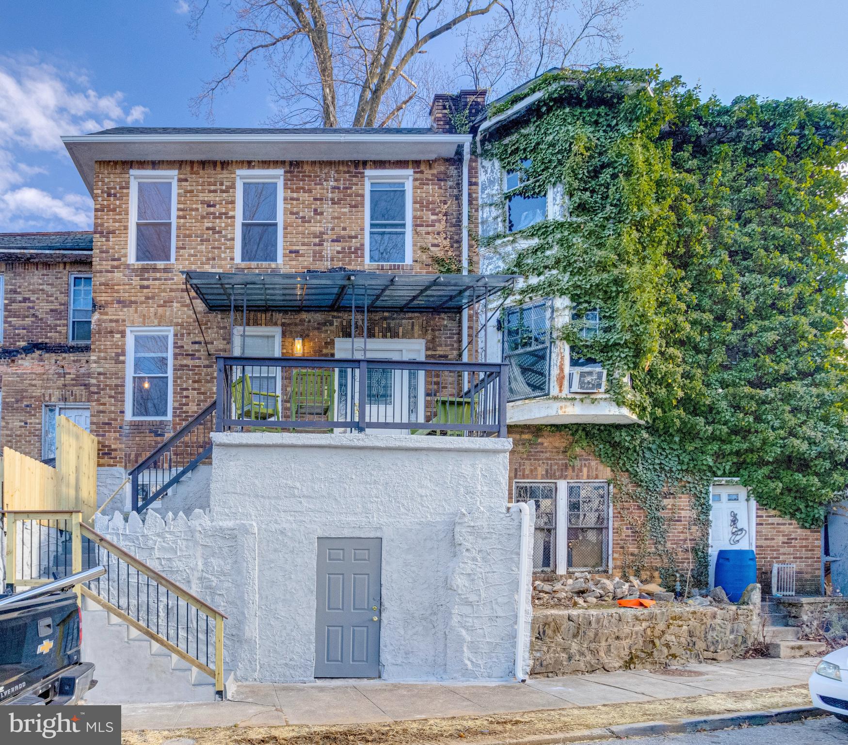 635 North Rosedale Street Baltimore, MD 21216 - Photo 2 of 64 a front view of a house with large windows
