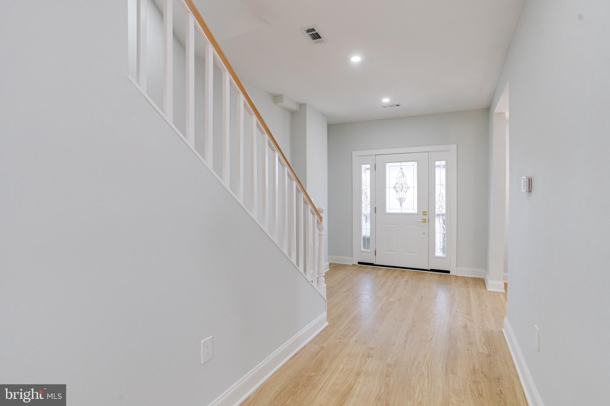 635 North Rosedale Street Baltimore, MD 21216 - Photo 23 of 64 a view of entryway with wooden floor