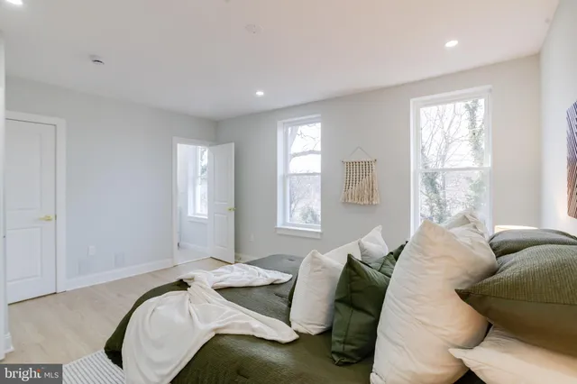 a bathroom with a shower and a tub