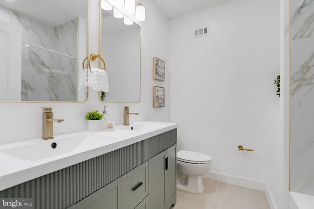 a view of an empty room with stairs