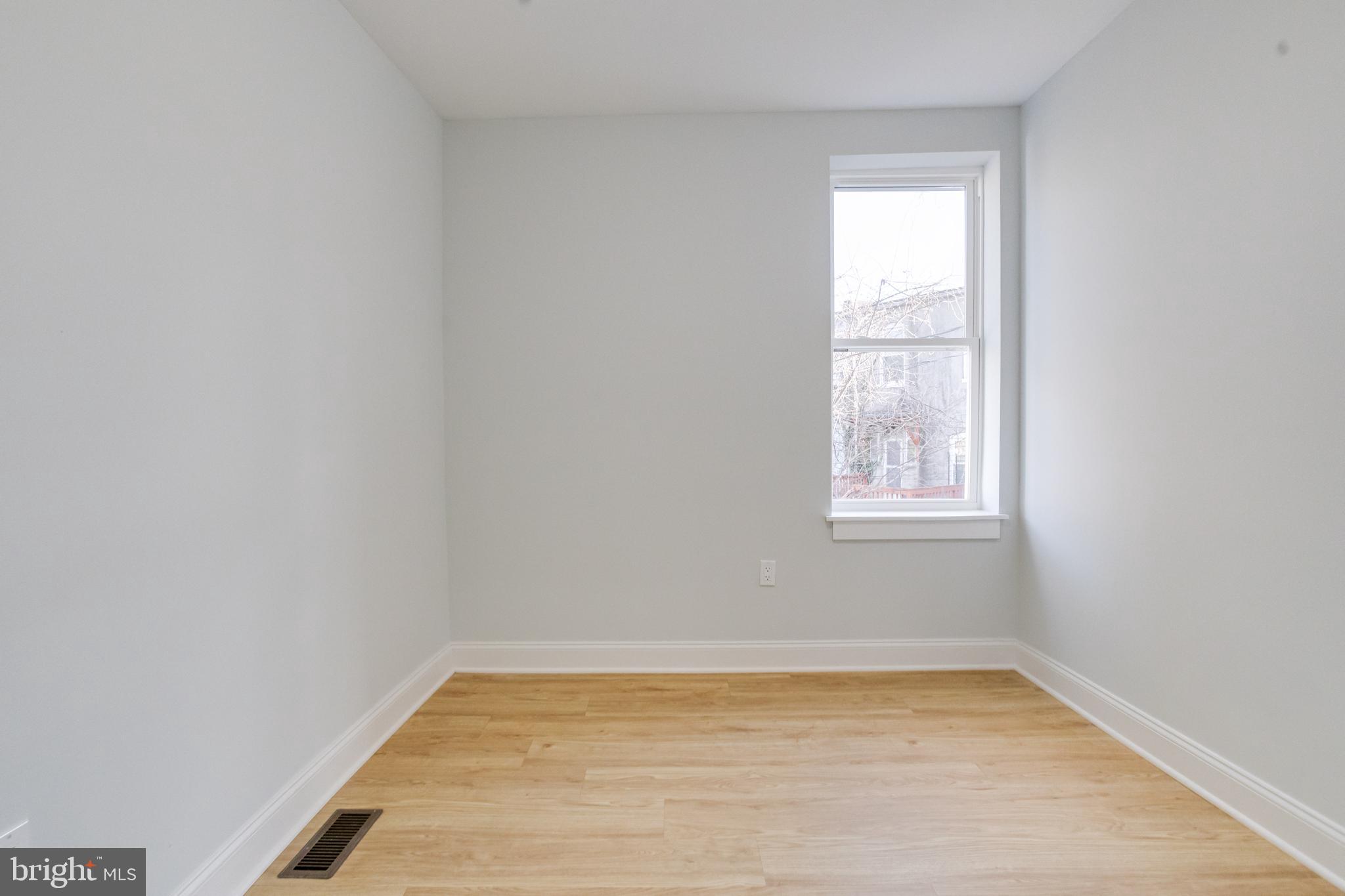 635 North Rosedale Street Baltimore, MD 21216 - Photo 46 of 64 an empty room with a window