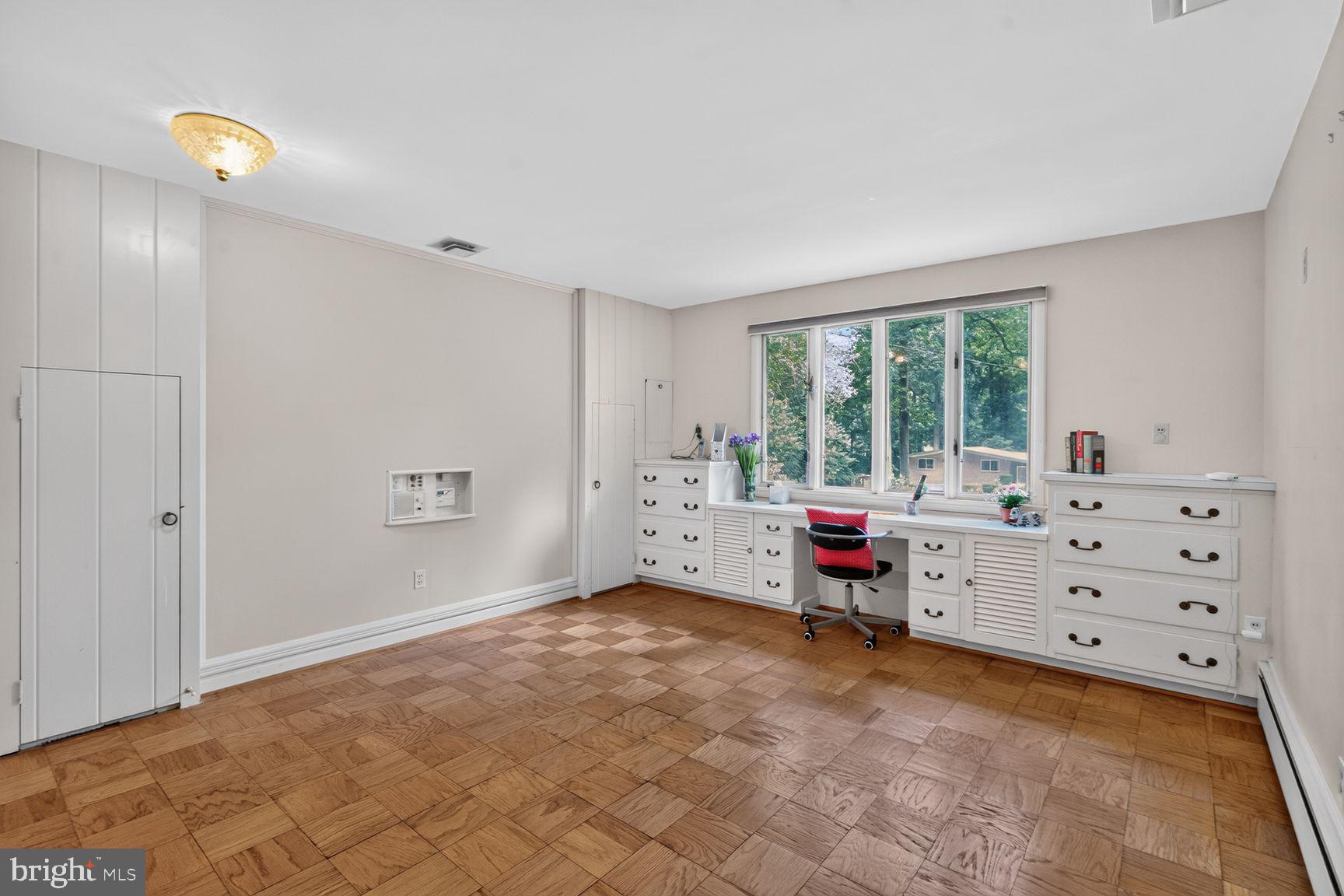1118 Orchard Way Silver Spring, MD 20904 - Photo 28 of 56 1st floor primary bedroom with cabinets