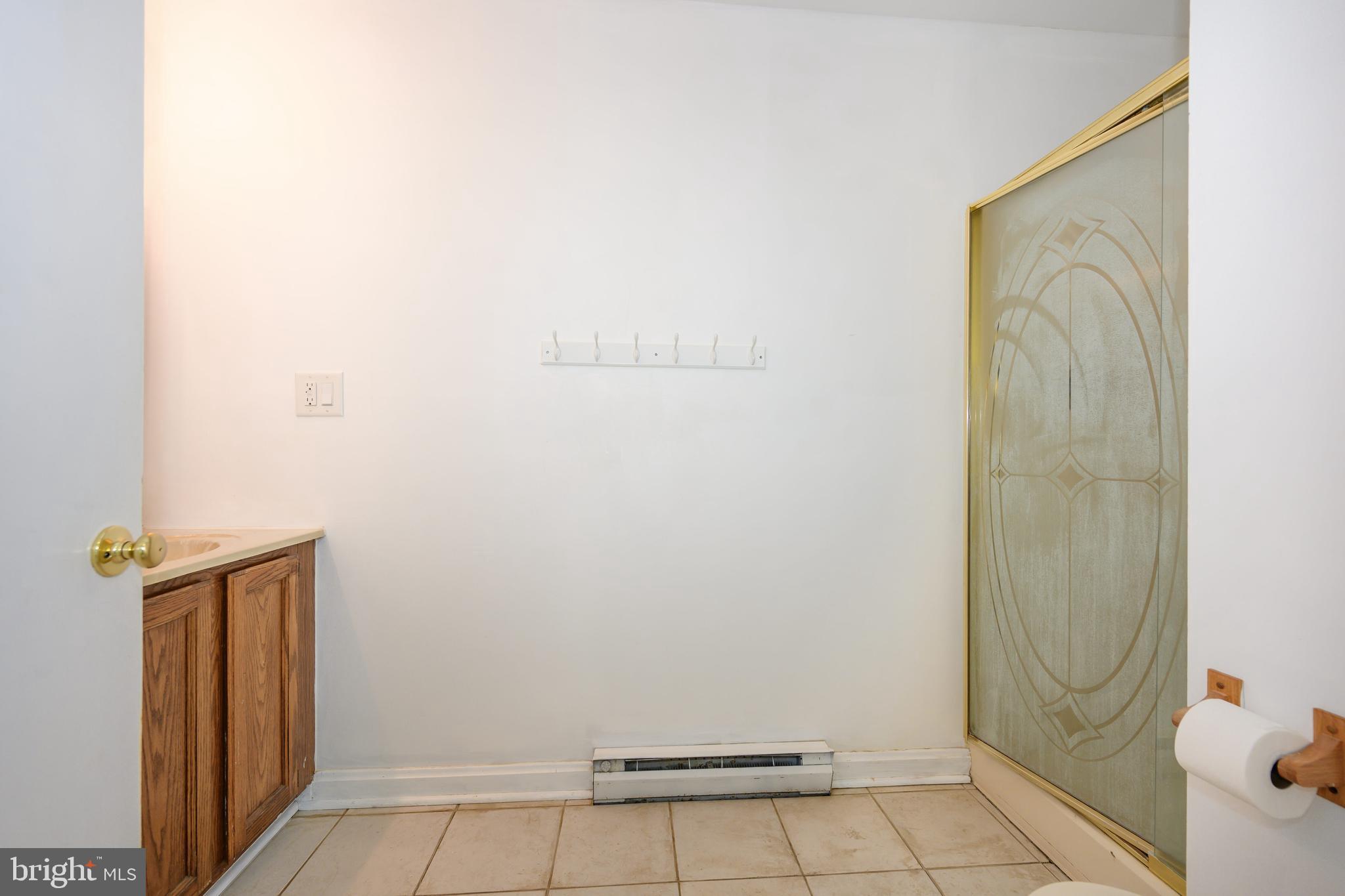 26648 Arcadia Shores Road Easton, MD 21601 - Photo 18 of 25 a view of a bathroom with a shower