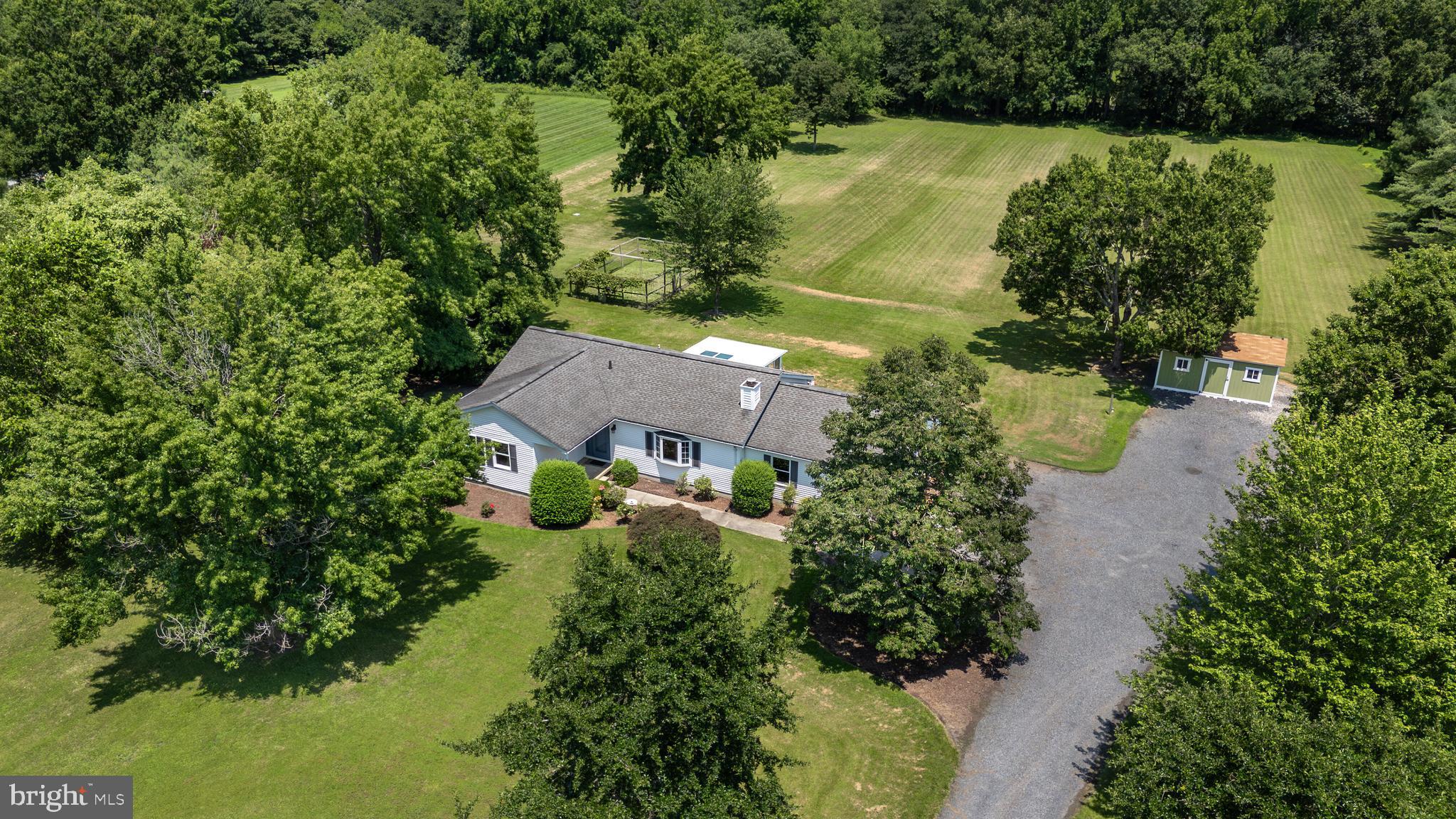 26648 Arcadia Shores Road Easton, MD 21601 - Photo 2 of 25 an aerial view of residential house with outdoor space and trees all around