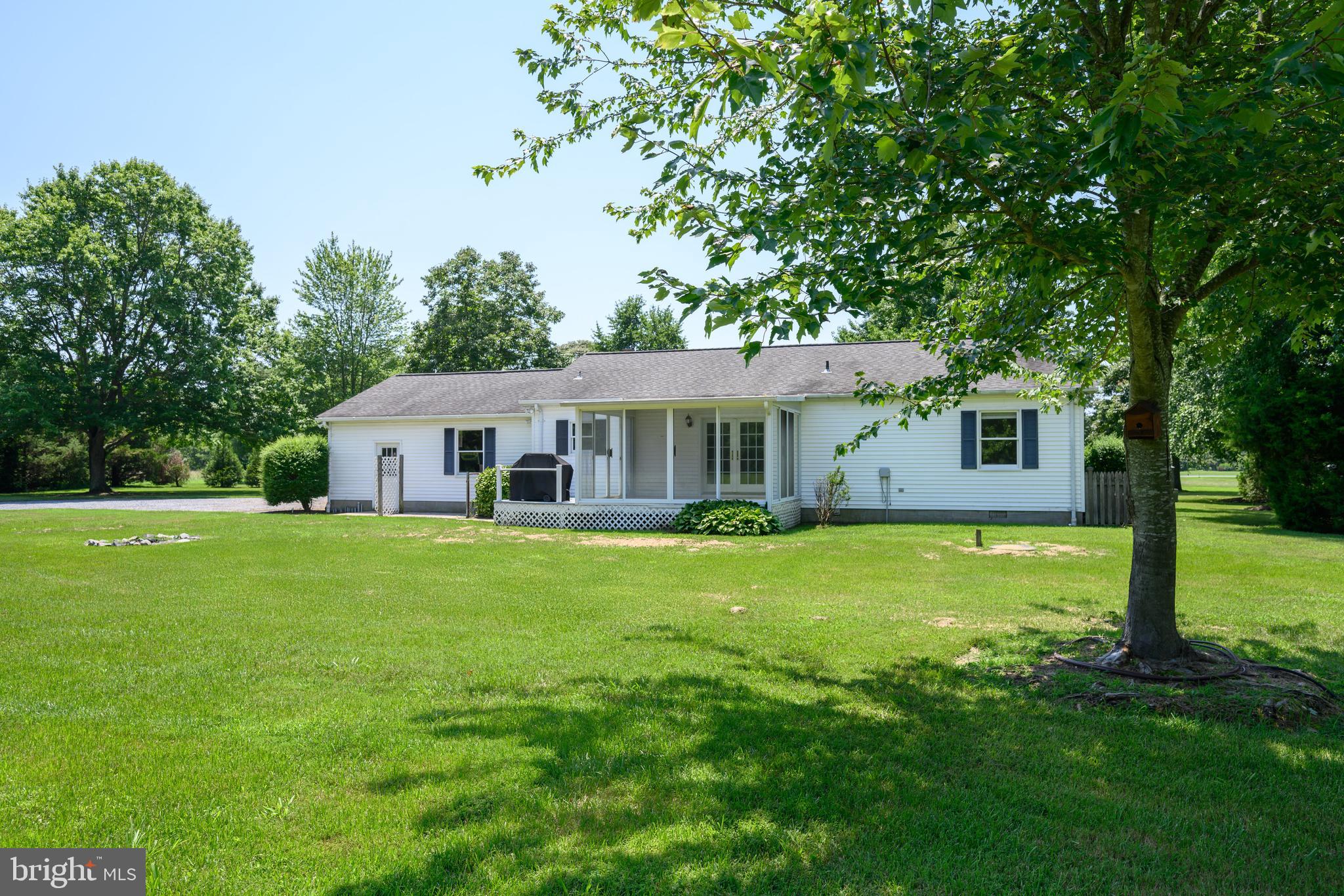 26648 Arcadia Shores Road Easton, MD 21601 - Photo 24 of 25 a front view of a house with a garden