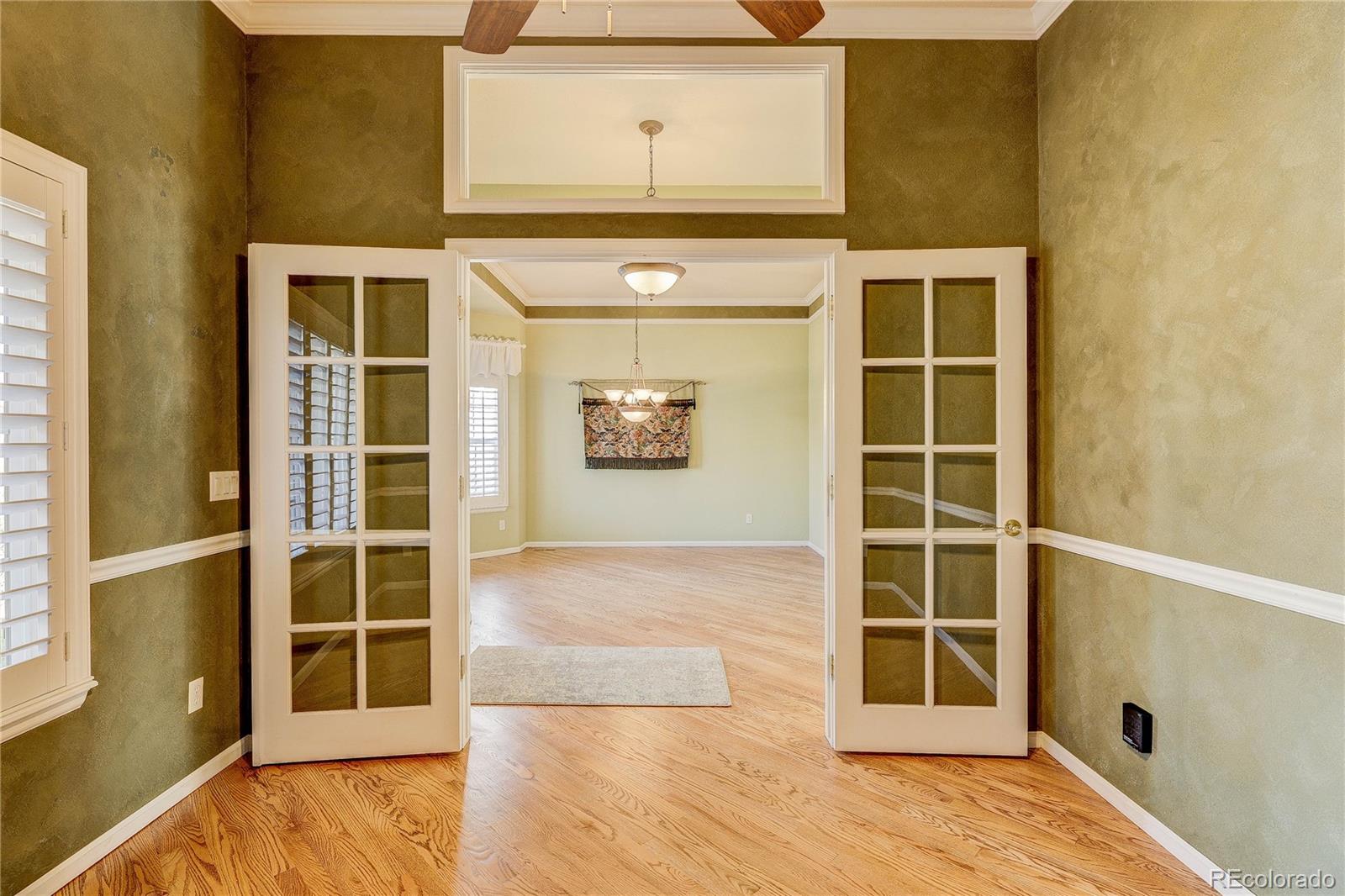 10292 South Nickolas Avenue Highlands Ranch, CO 80124 - Photo 12 of 46 a view of front door
