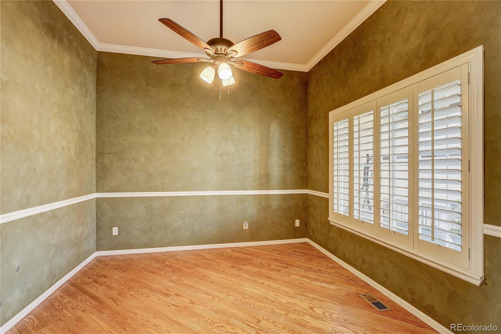 10292 South Nickolas Avenue Highlands Ranch, CO 80124 - Photo 13 of 46 a view of an empty room with a window