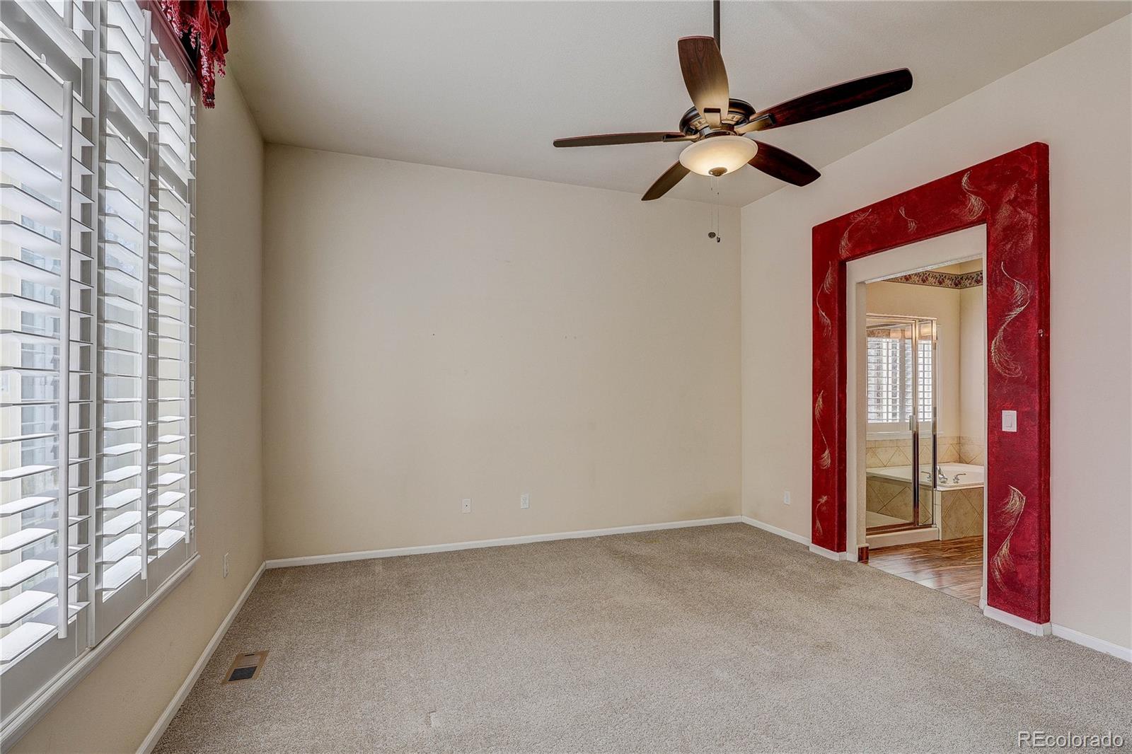 10292 South Nickolas Avenue Highlands Ranch, CO 80124 - Photo 18 of 46 a view of empty room with ceiling fan