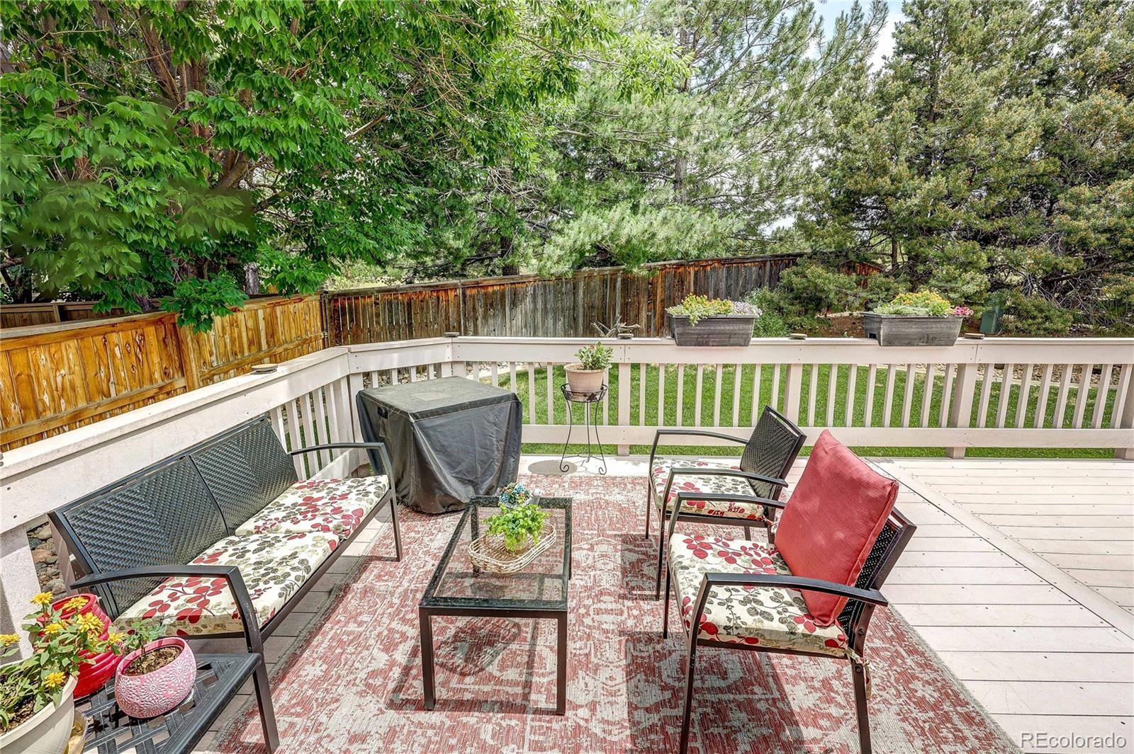 10292 South Nickolas Avenue Highlands Ranch, CO 80124 - Photo 32 of 46 a view of a chairs and table in the balcony