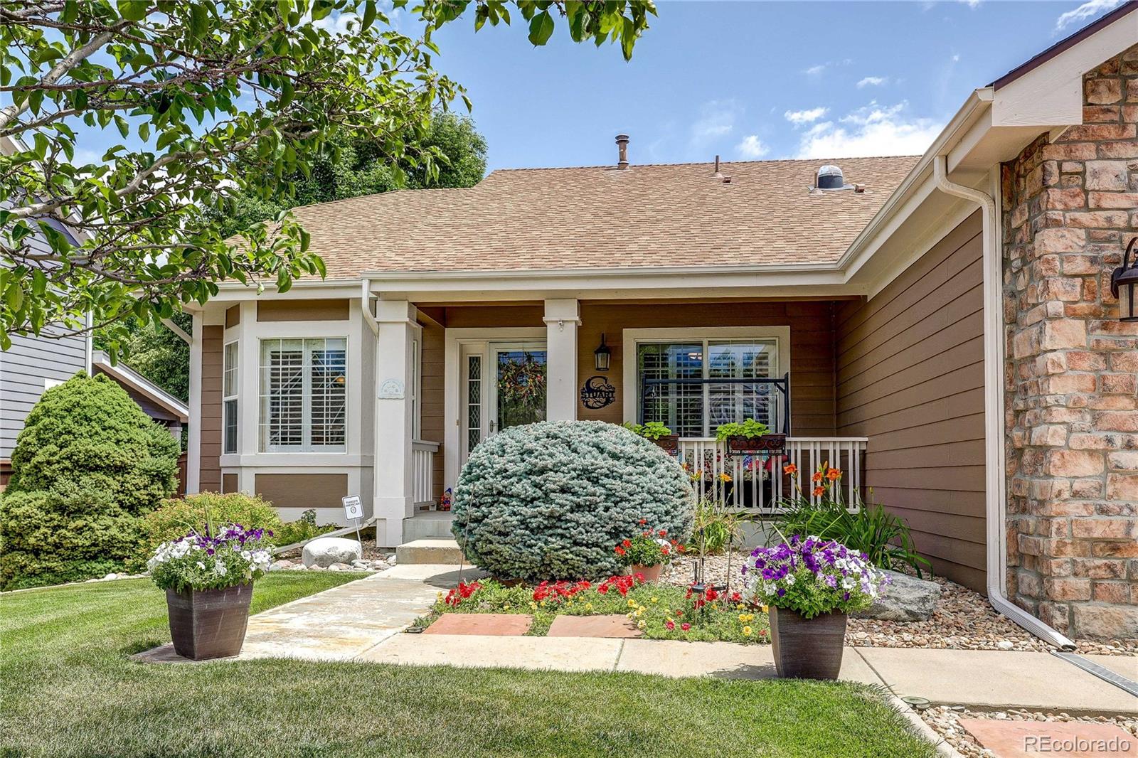 10292 South Nickolas Avenue Highlands Ranch, CO 80124 - Photo 40 of 46 a house view with a seating space