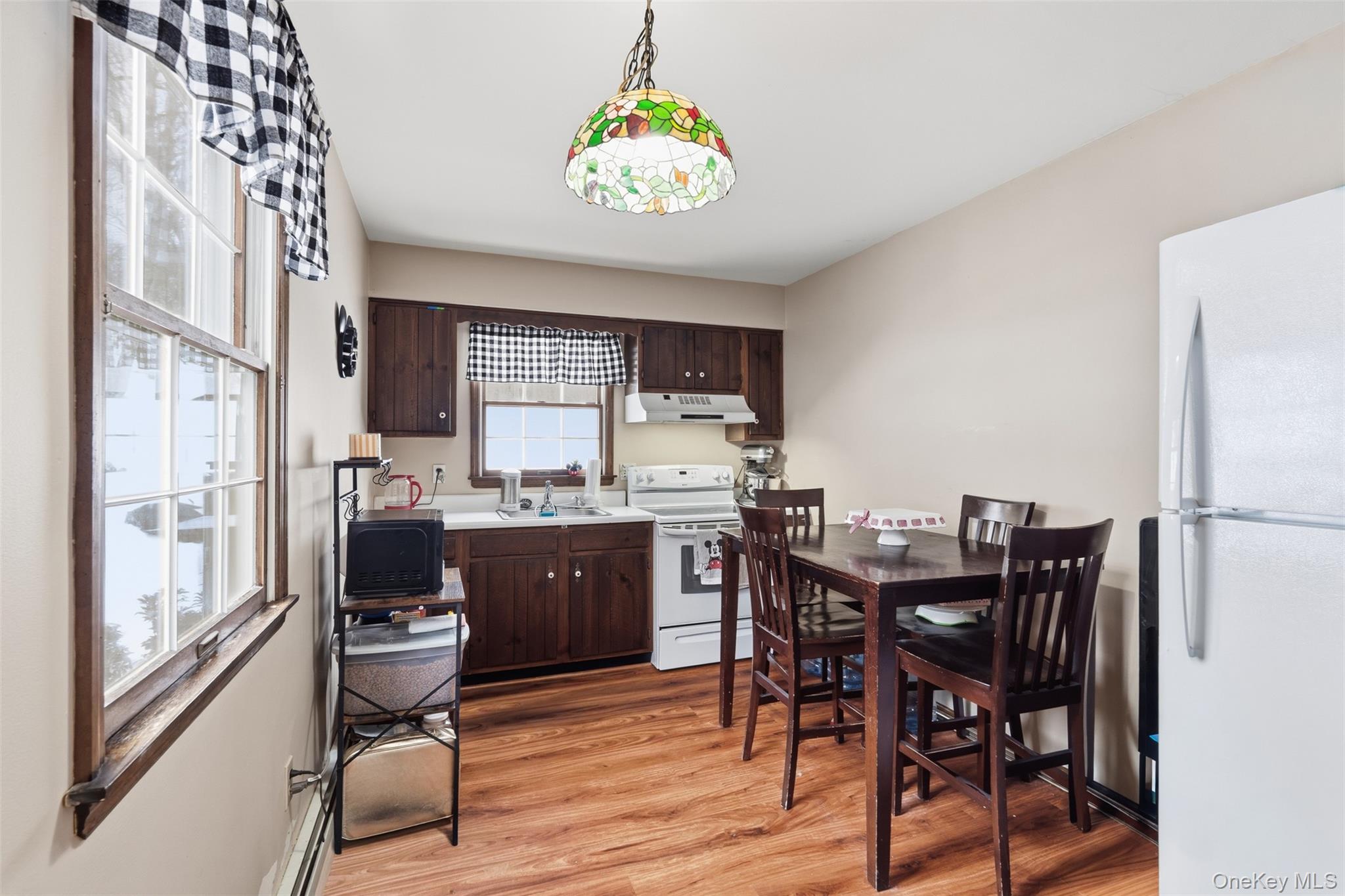 113 Buckberg Road Stony Point, NY 10986 - Photo 20 of 33 a view of a dining room with furniture window and wooden floor