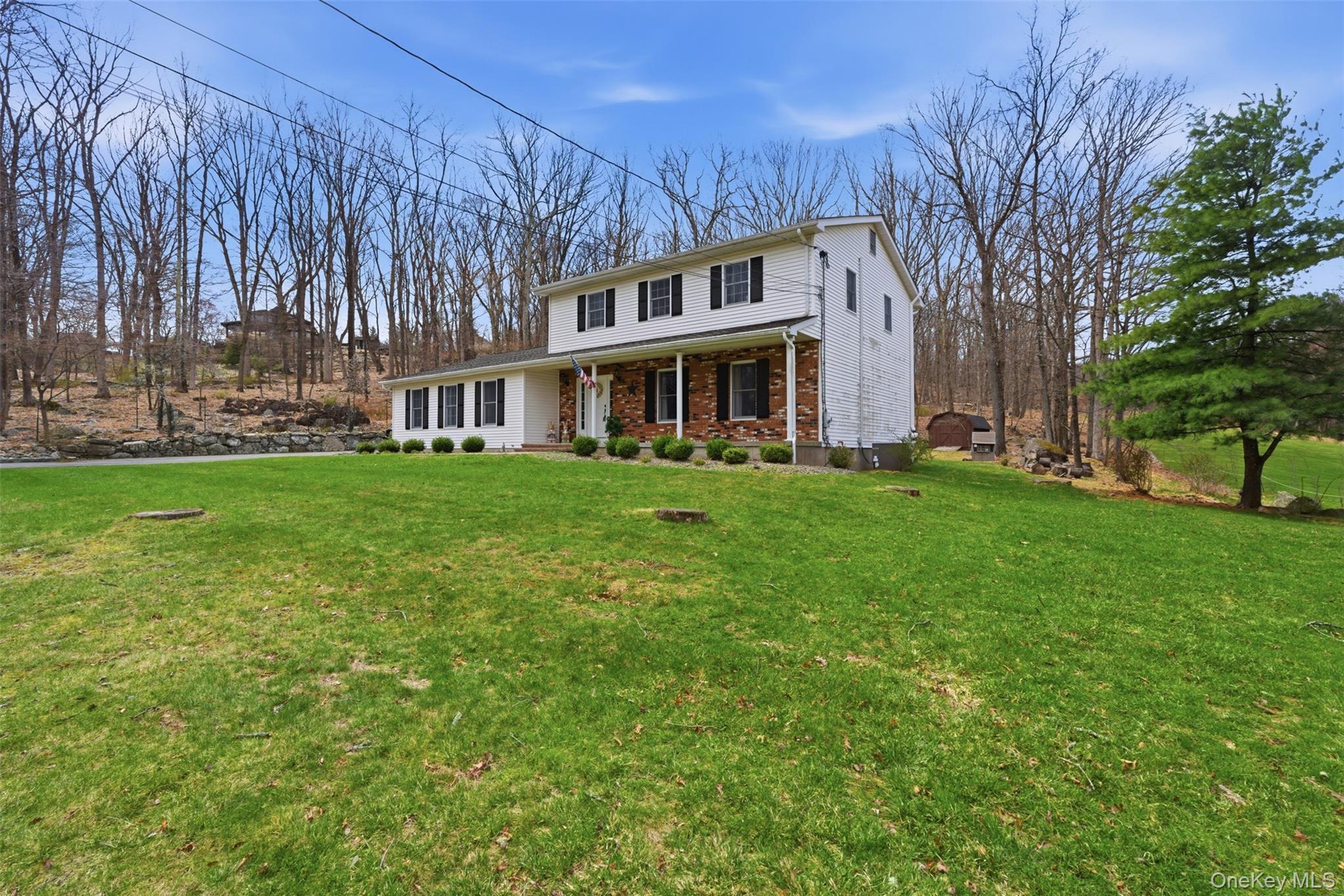 113 Buckberg Road Stony Point, NY 10986 - Photo 3 of 33 a view of a house with a big yard and large trees