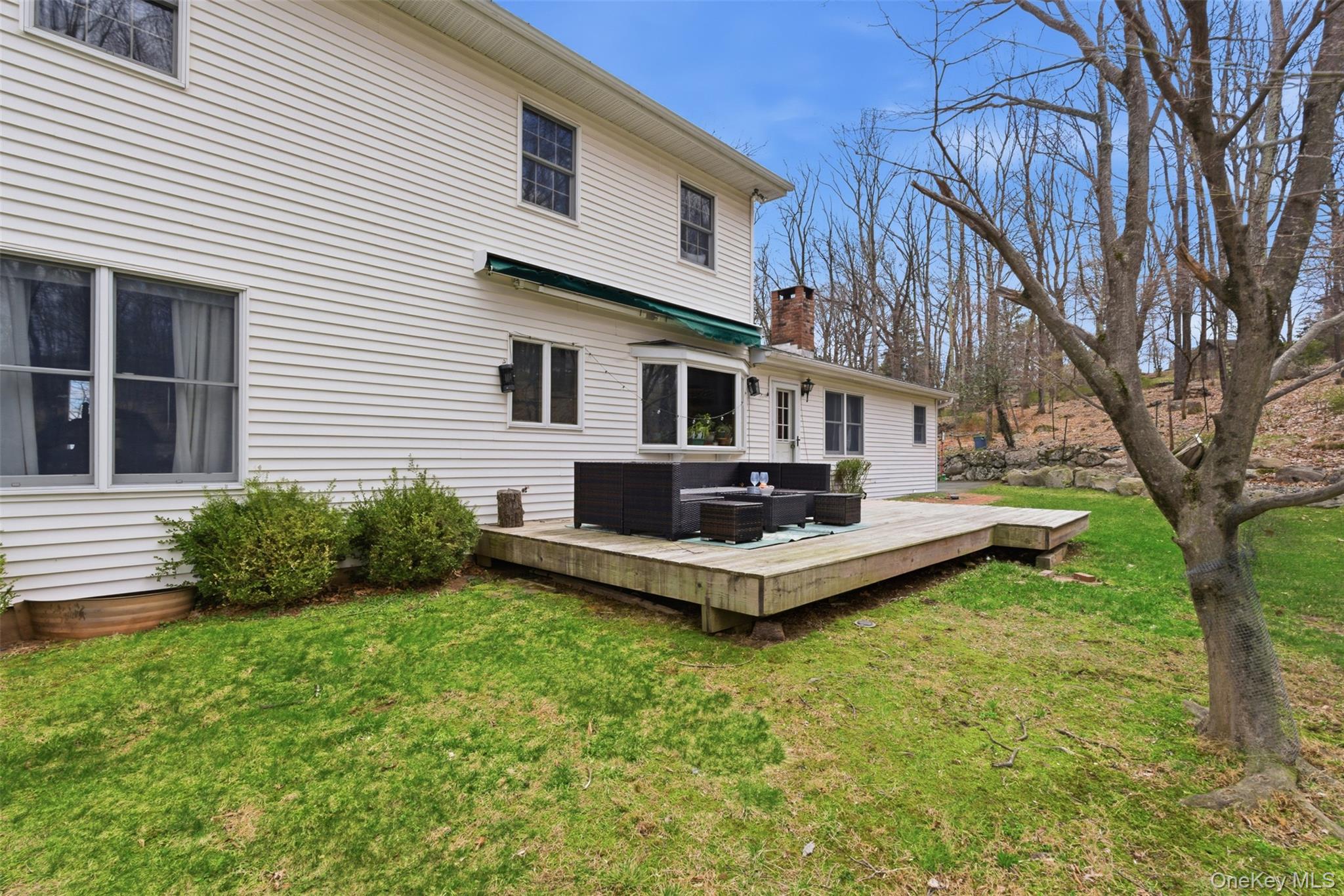 113 Buckberg Road Stony Point, NY 10986 - Photo 33 of 33 a front view of a house with a garden and yard