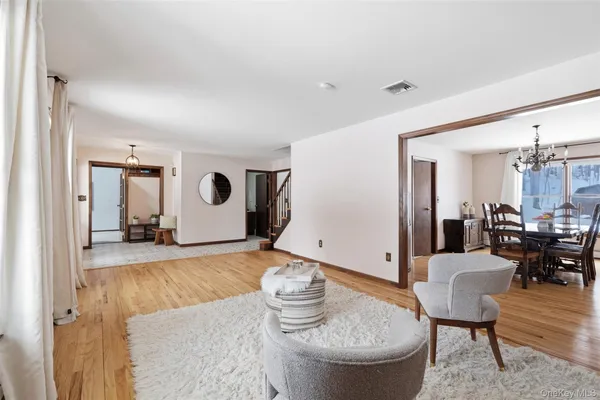 a living room with furniture and a table