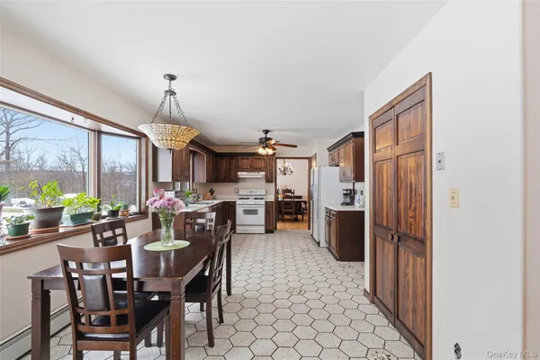 a view of a dining room with furniture