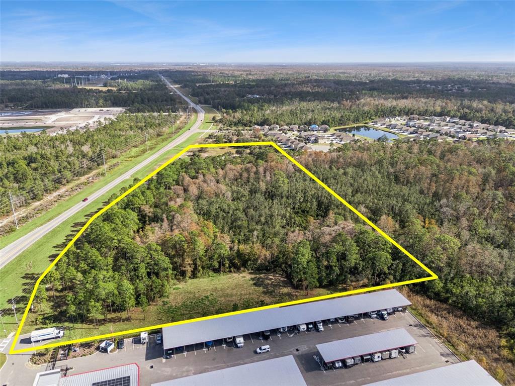 Osceola Polk Line Road Davenport, FL 33896 - Photo 13 of 16 an aerial view of a city