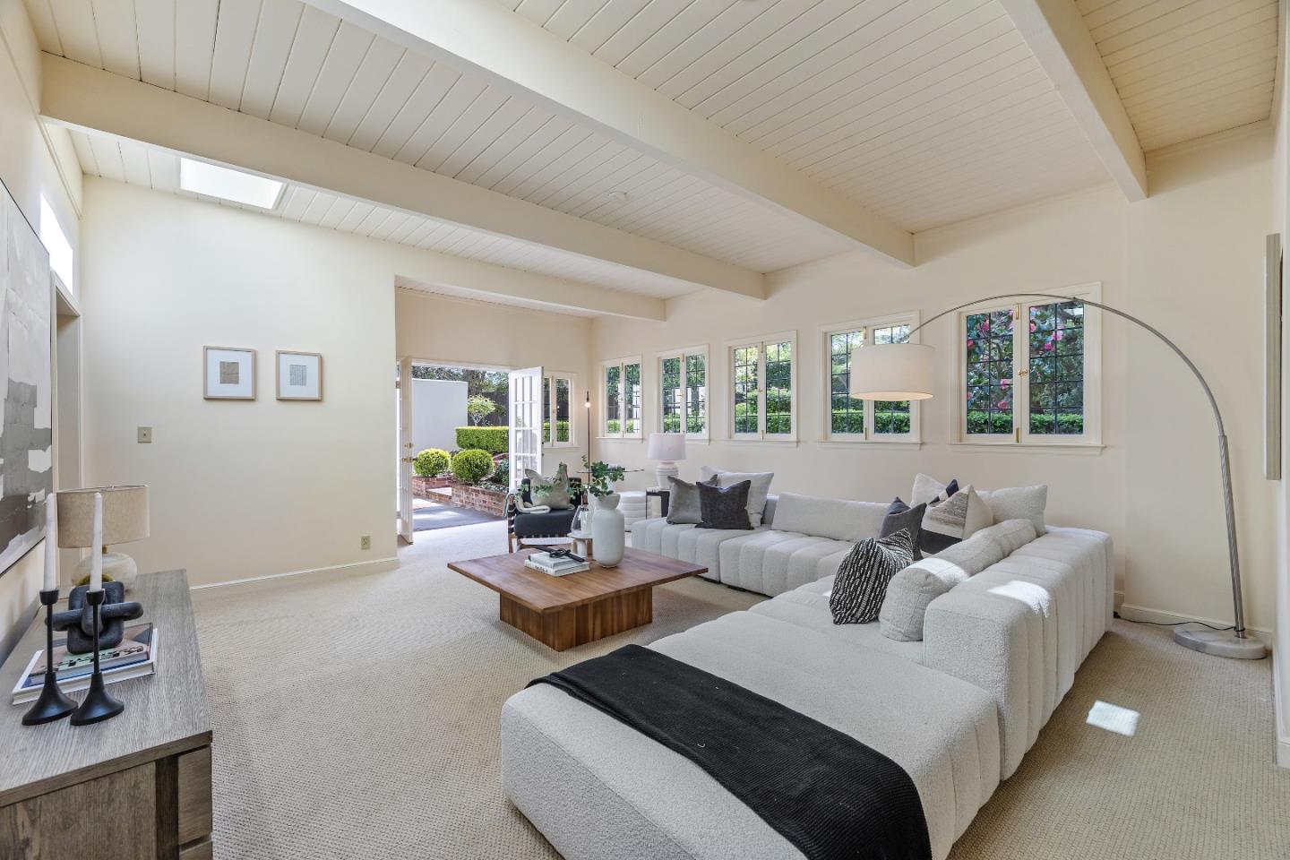 460 Edgewood Road San Mateo, CA 94402 - Photo 12 of 40 a living room with furniture and a large mirror