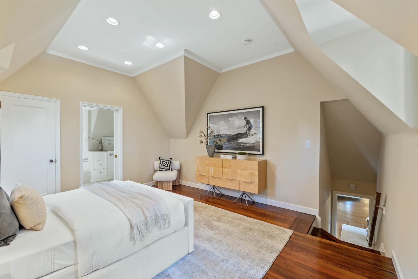 460 Edgewood Road San Mateo, CA 94402 - Photo 17 of 40 a bedroom with a bed and wooden floor