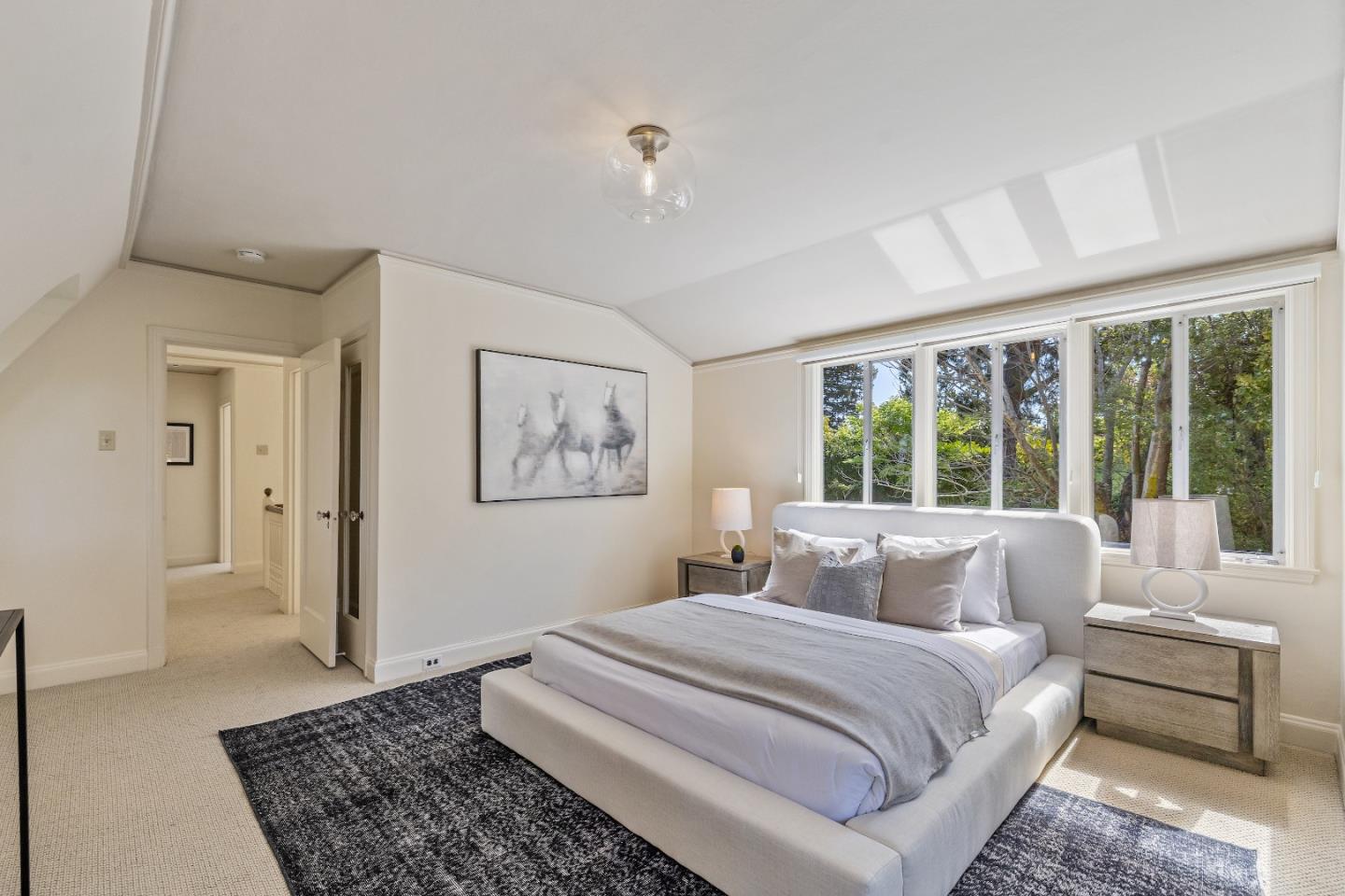 460 Edgewood Road San Mateo, CA 94402 - Photo 21 of 40 a bedroom with a large bed and a window