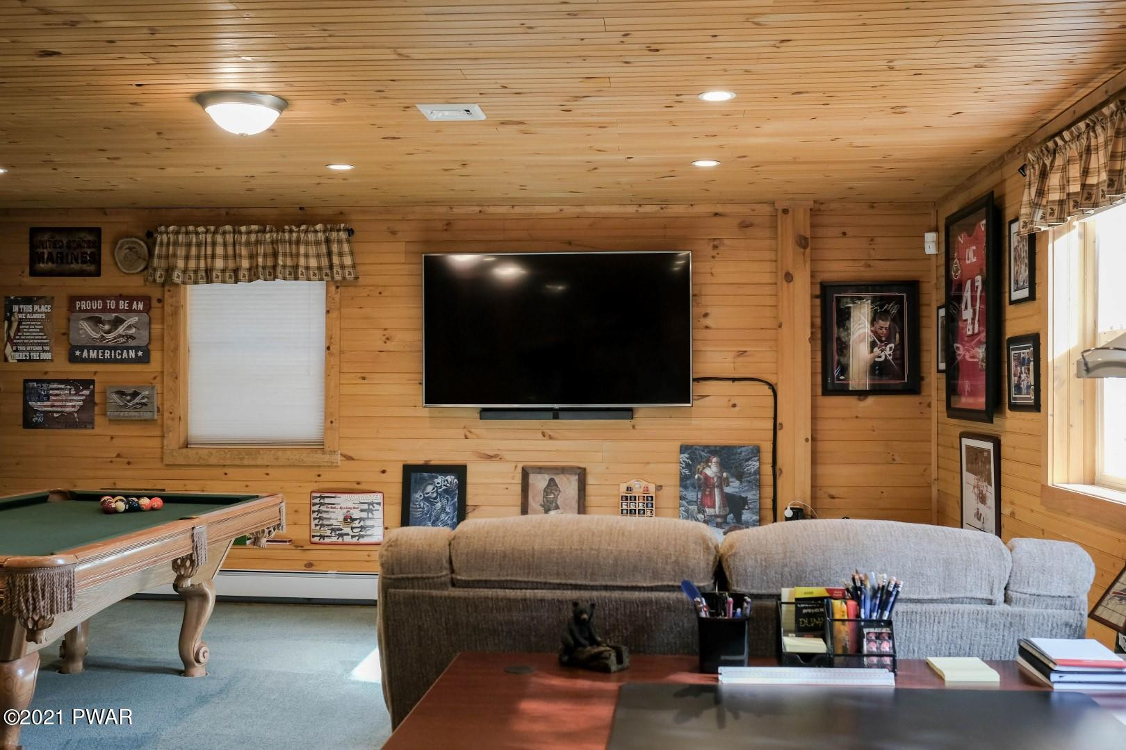 118 Cindy Court Newfoundland, PA 18445 - Photo 61 of 78 a living room with furniture and a flat screen tv