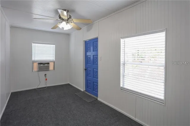 a view of a livingroom with a window