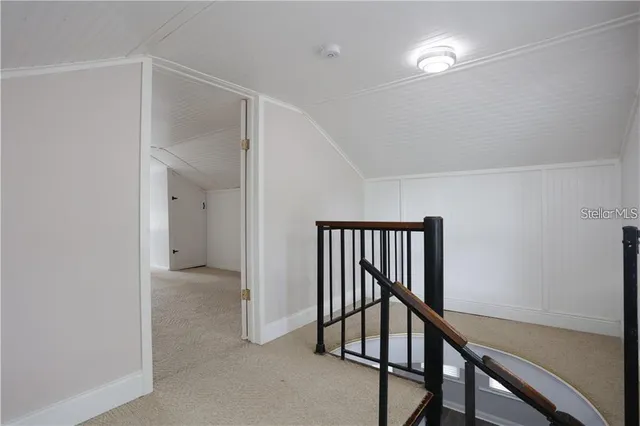 a view of a room with a large window