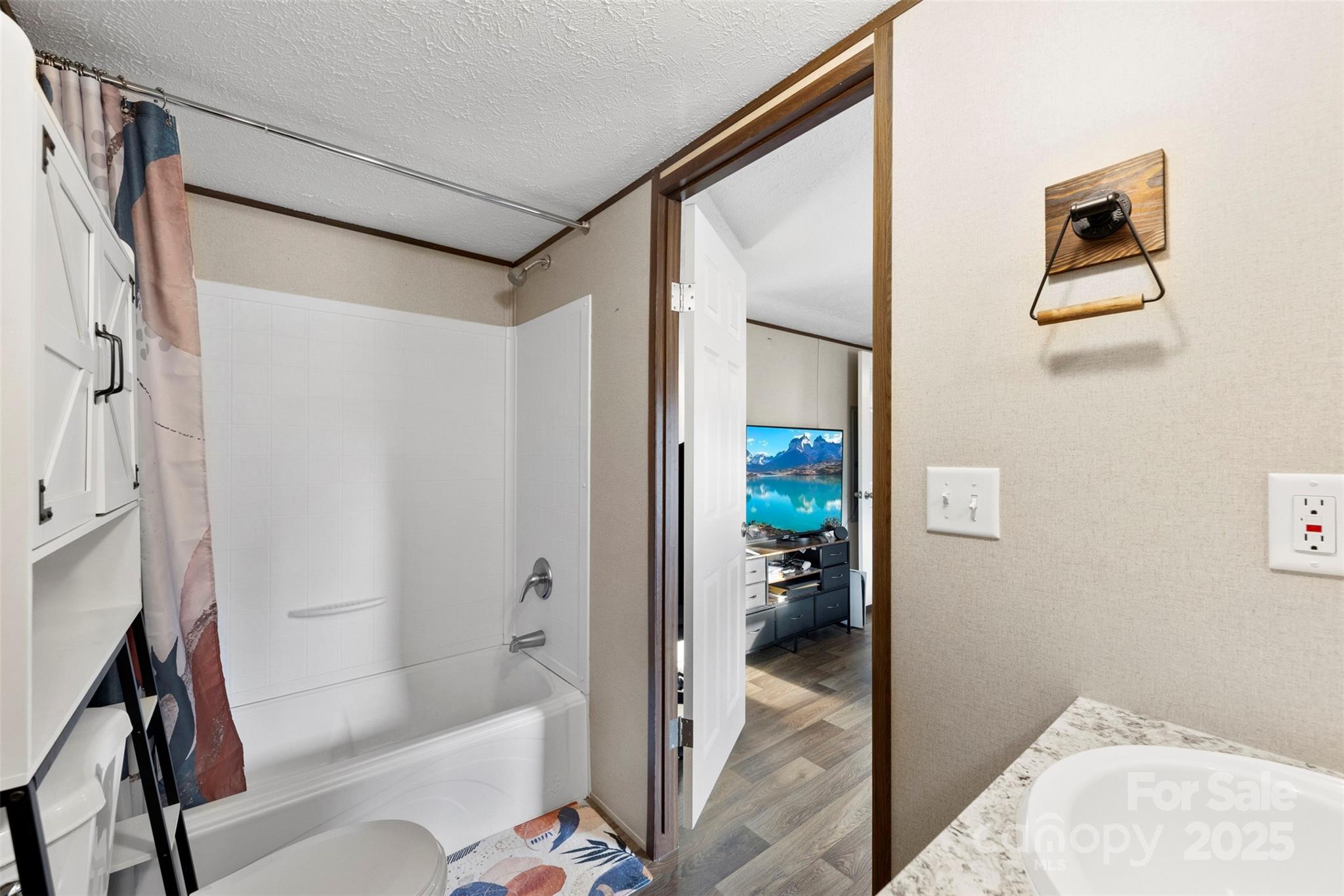 3051 Shoal Road Crouse, NC 28033 - Photo 18 of 26 a bathroom with a tub and shower