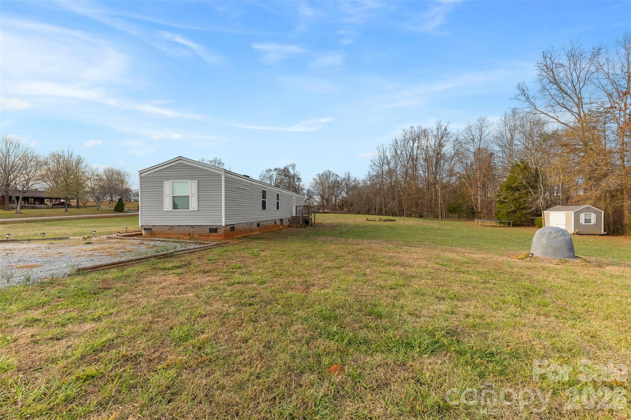 3051 Shoal Road Crouse, NC 28033 - Photo 22 of 26 a view of a house with a yard