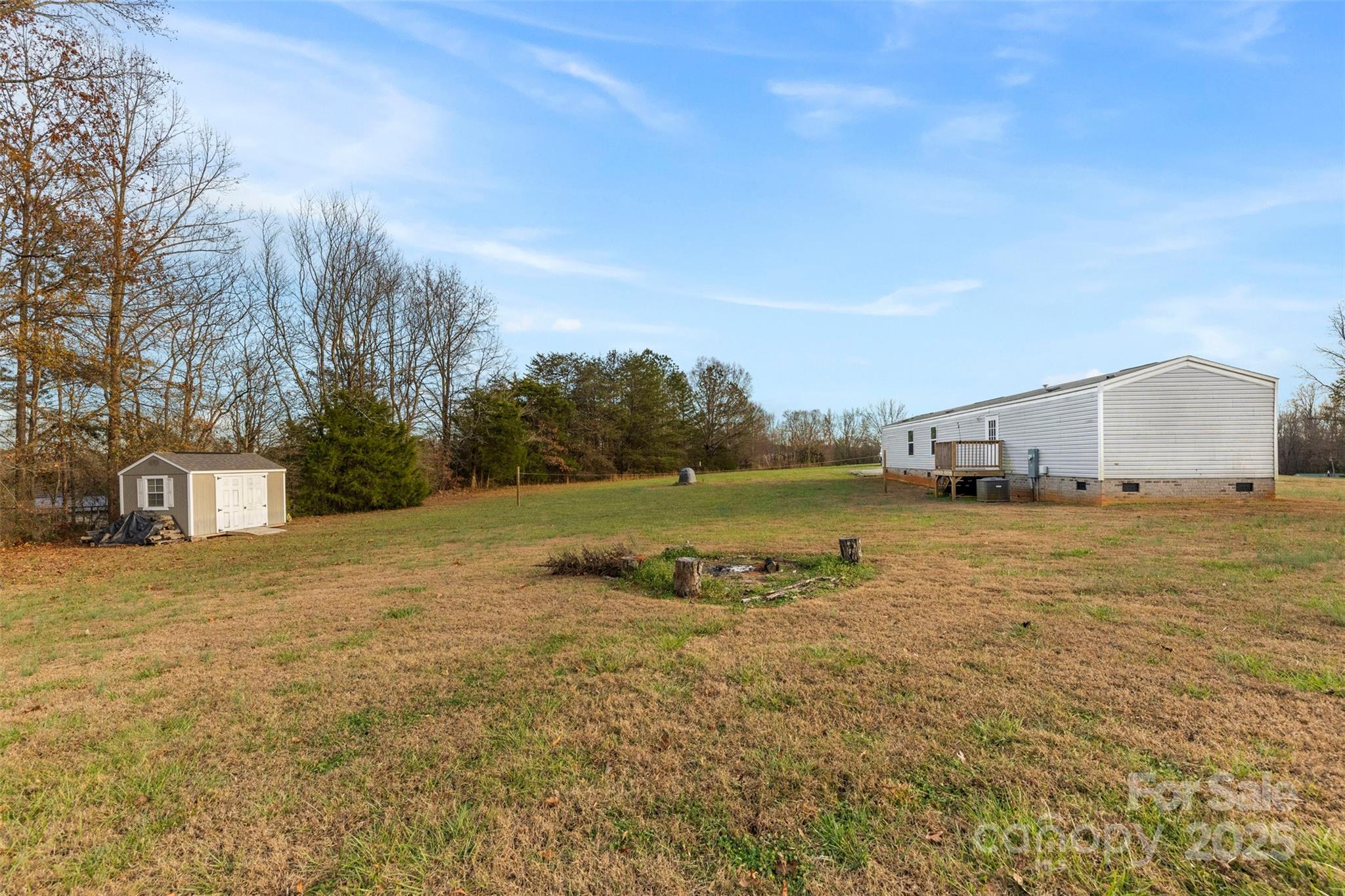 3051 Shoal Road Crouse, NC 28033 - Photo 23 of 26 a view of a house with a yard