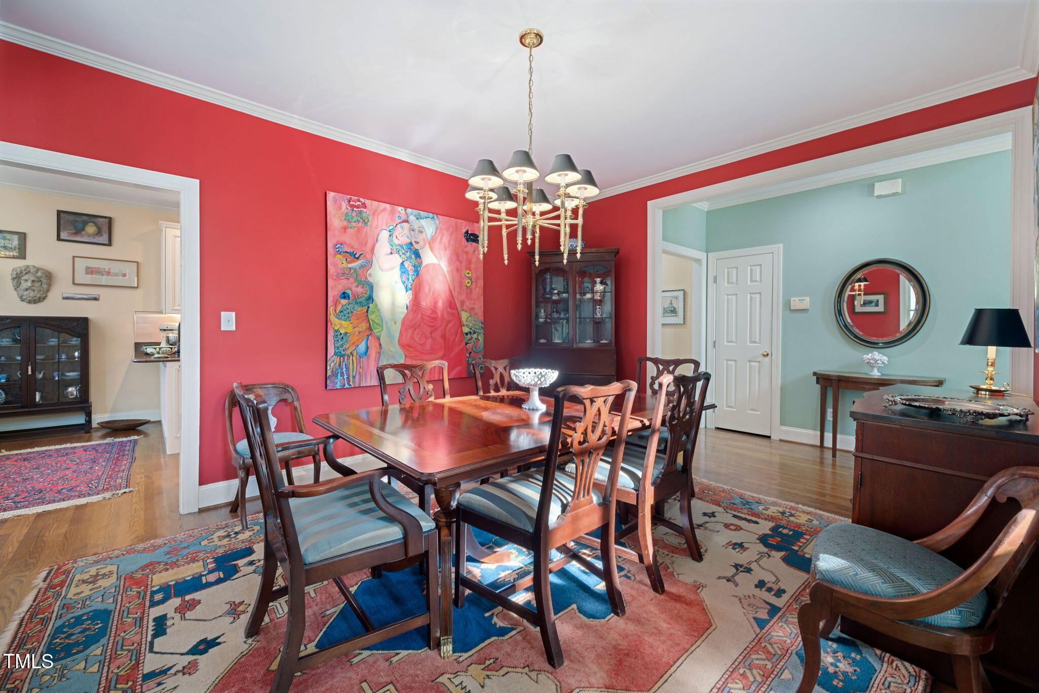 2714 B Clark Avenue Raleigh, NC 27607 - Photo 27 of 38 a view of a dining room with furniture and chandelier