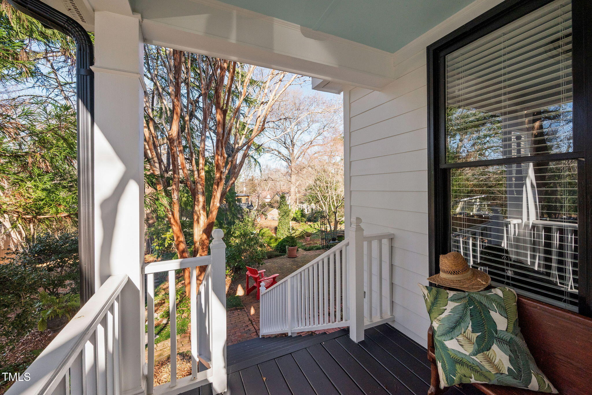 2714 B Clark Avenue Raleigh, NC 27607 - Photo 28 of 38 a balcony with wooden floor and outdoor space