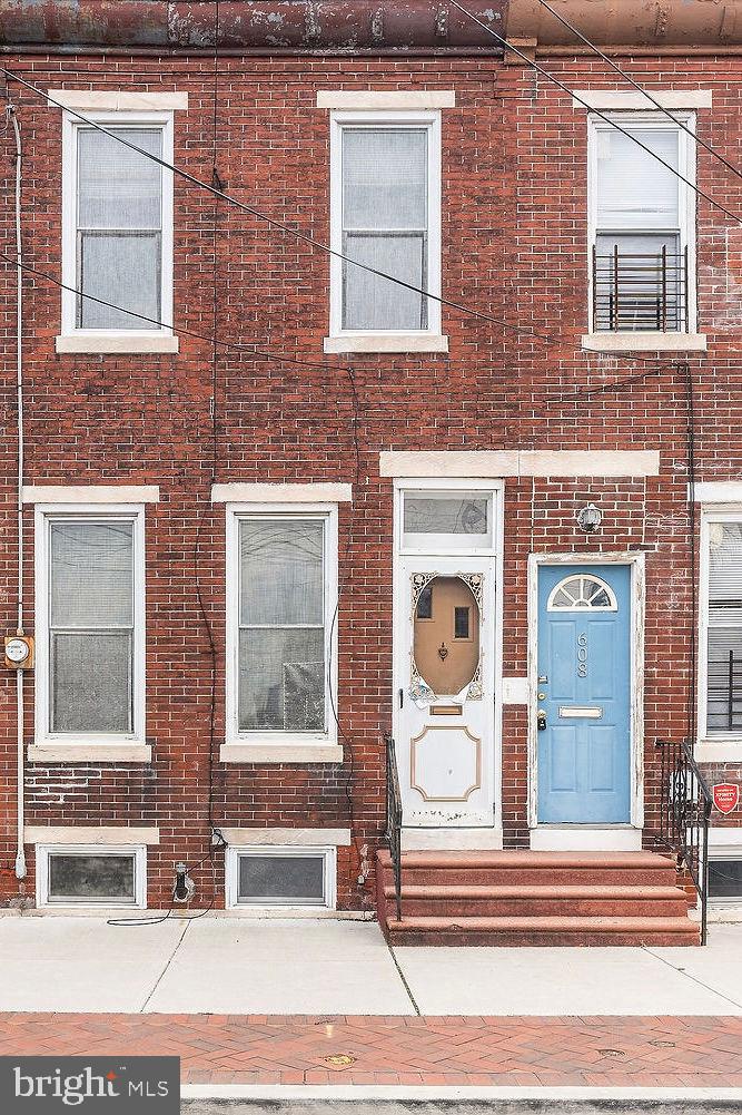 610 Point Street Camden, NJ 08102 - Photo 1 of 23 front view of a brick house with a window