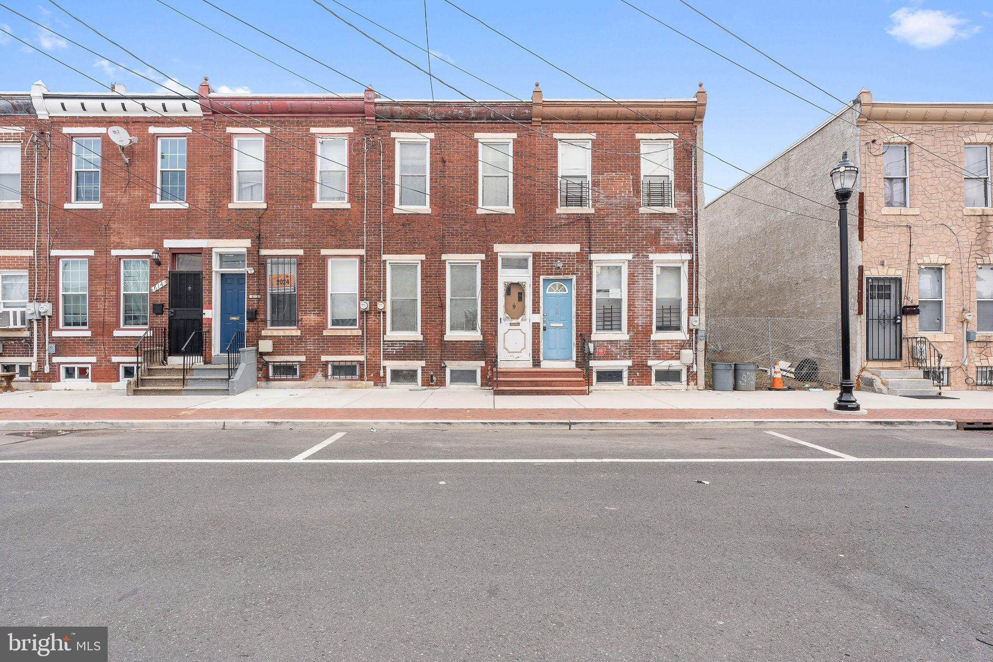 610 Point Street Camden, NJ 08102 - Photo 2 of 23 a city view with tall buildings