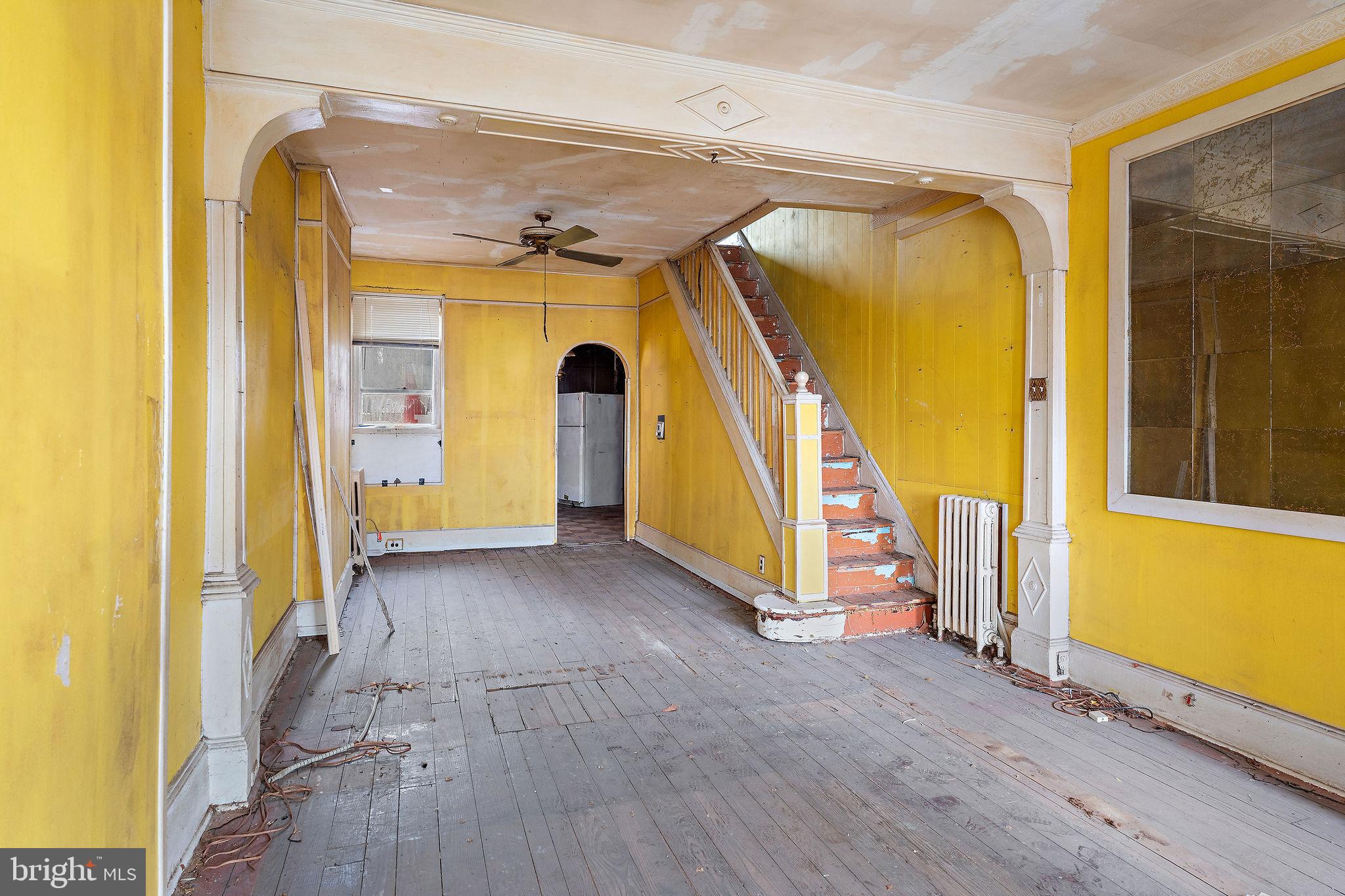610 Point Street Camden, NJ 08102 - Photo 5 of 23 a view of a room with wooden floor and windows