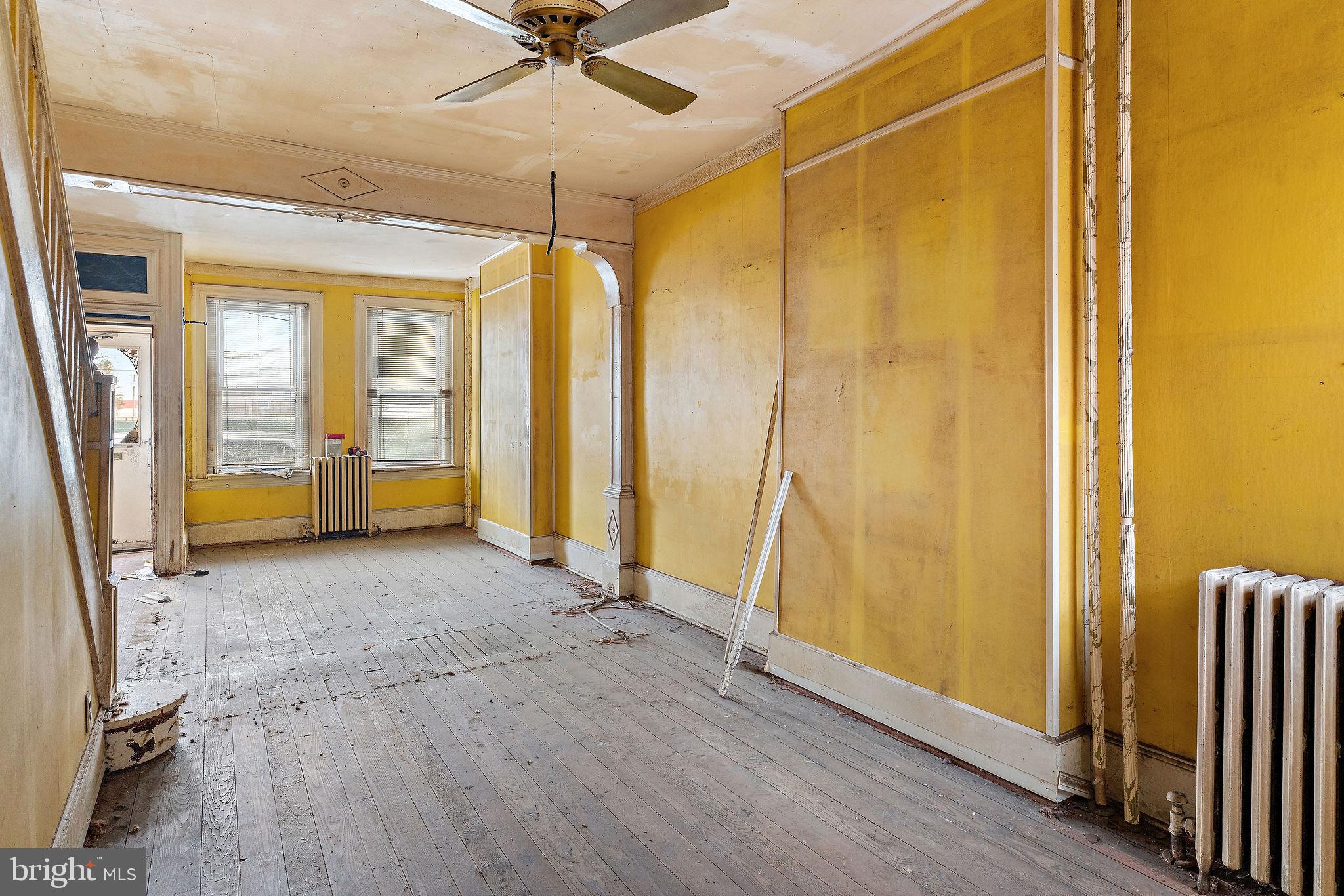 610 Point Street Camden, NJ 08102 - Photo 8 of 23 a view of a room with wooden floor and windows