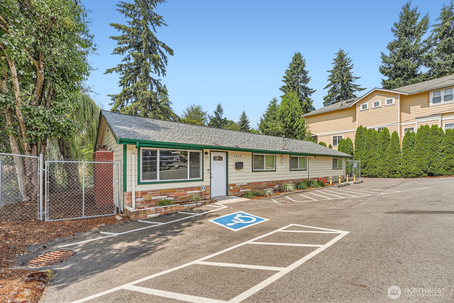 1409 Union Avenue Northeast Renton, WA 98059 - Photo 1 of 23 a view of a house with a patio