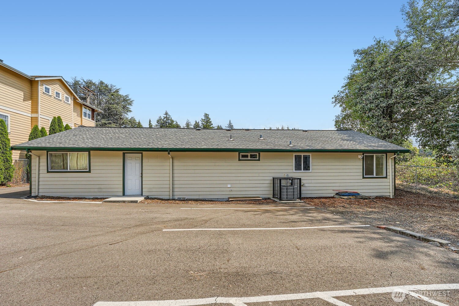 1409 Union Avenue Northeast Renton, WA 98059 - Photo 23 of 23 a house that has a tree in front of it