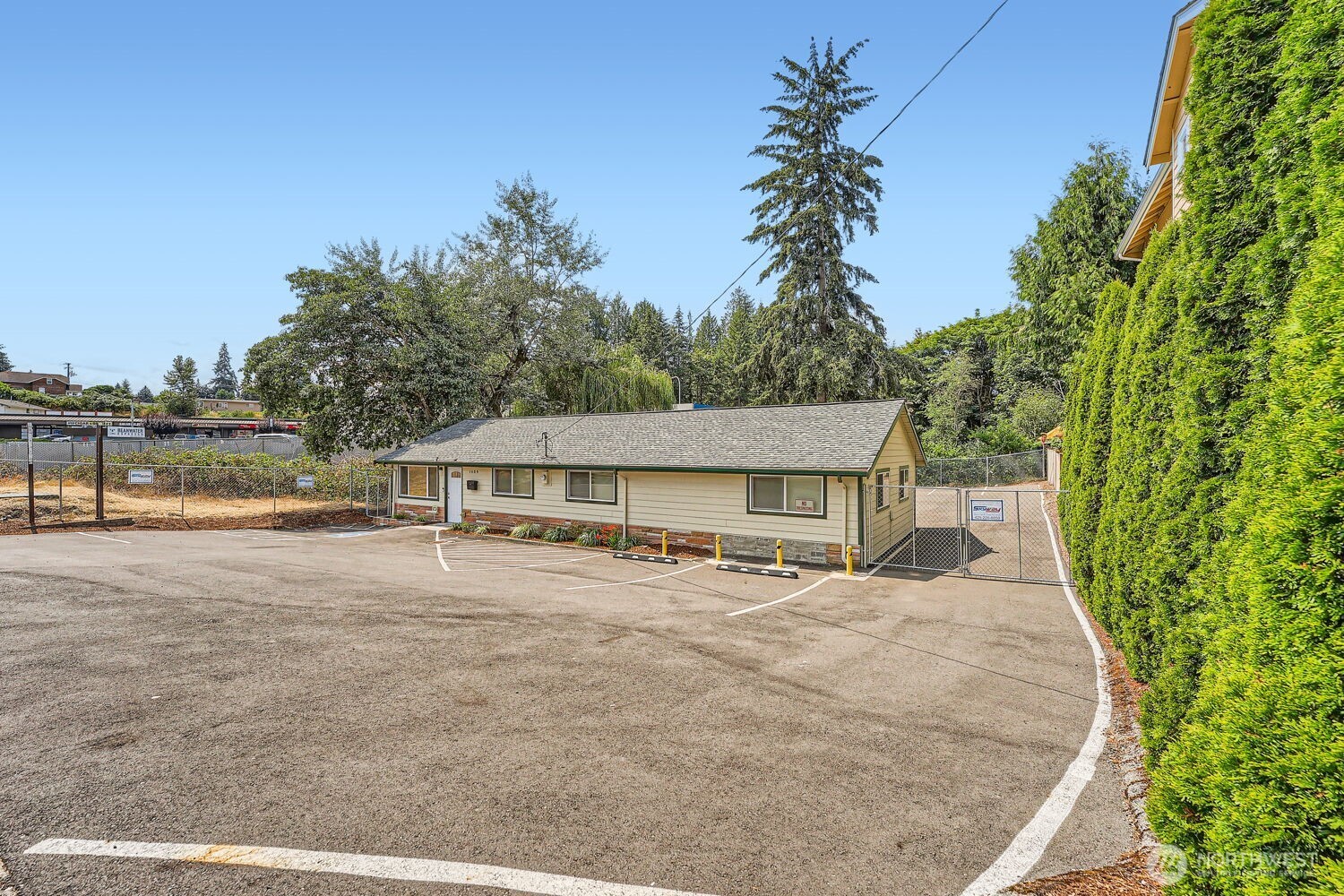 1409 Union Avenue Northeast Renton, WA 98059 - Photo 3 of 23 front view of a house with a yard