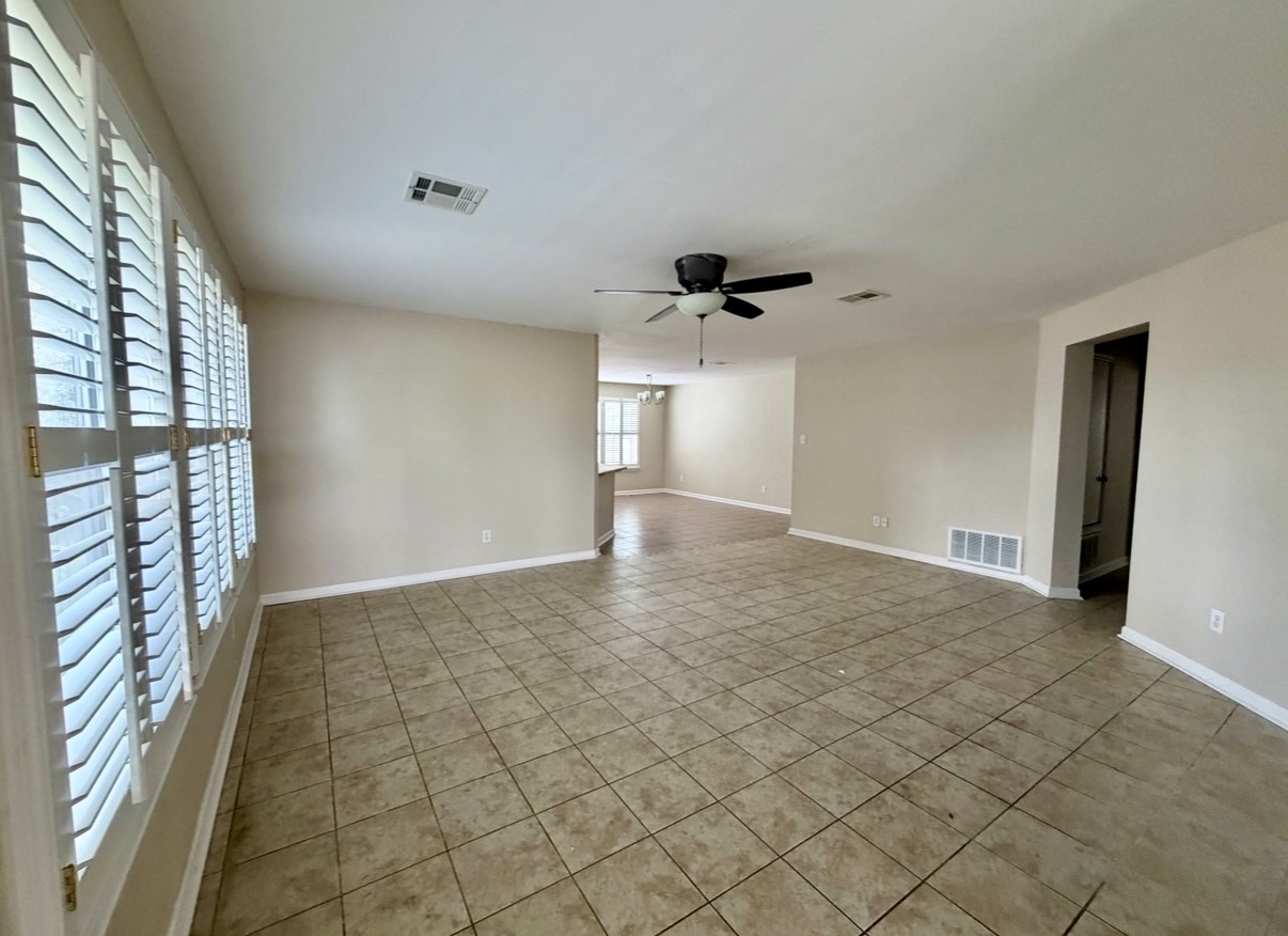1148 Amberwood Loop Kyle, TX 78640 - Photo 3 of 20 a view of an empty room and window