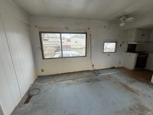 an empty room with windows