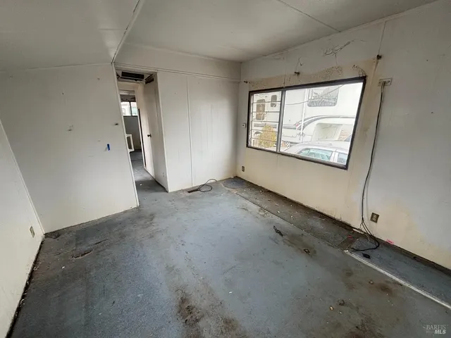 an empty room with windows