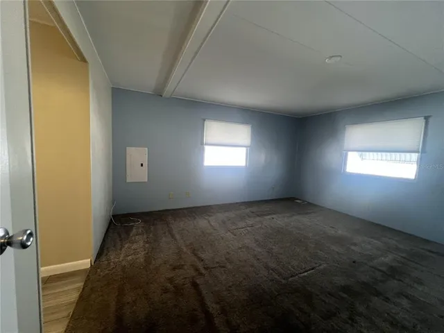 en empty room with windows