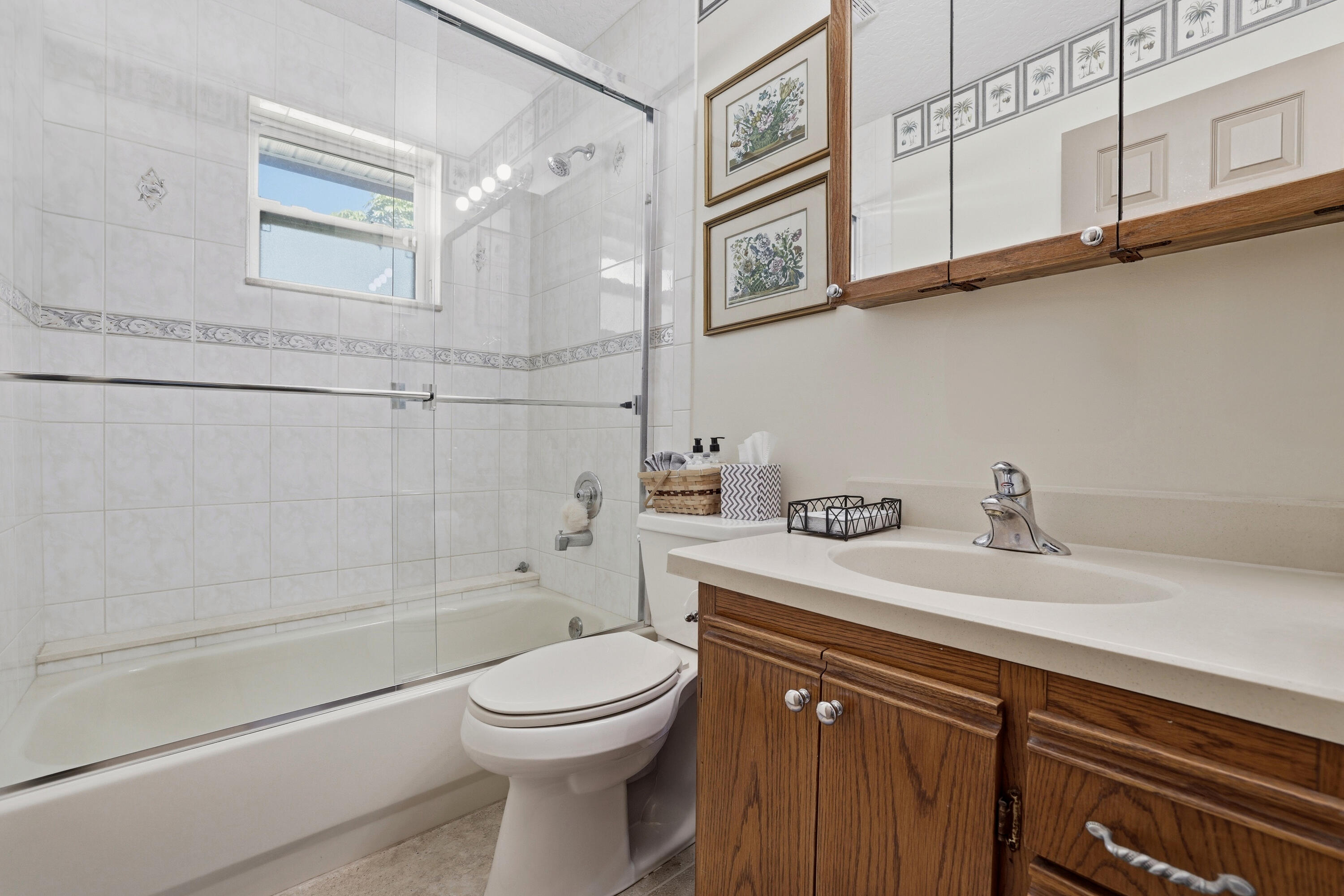 14095 Biddex Road Loxahatchee Groves, FL 33470 - Photo 25 of 69 a bathroom with a sink a toilet and shower