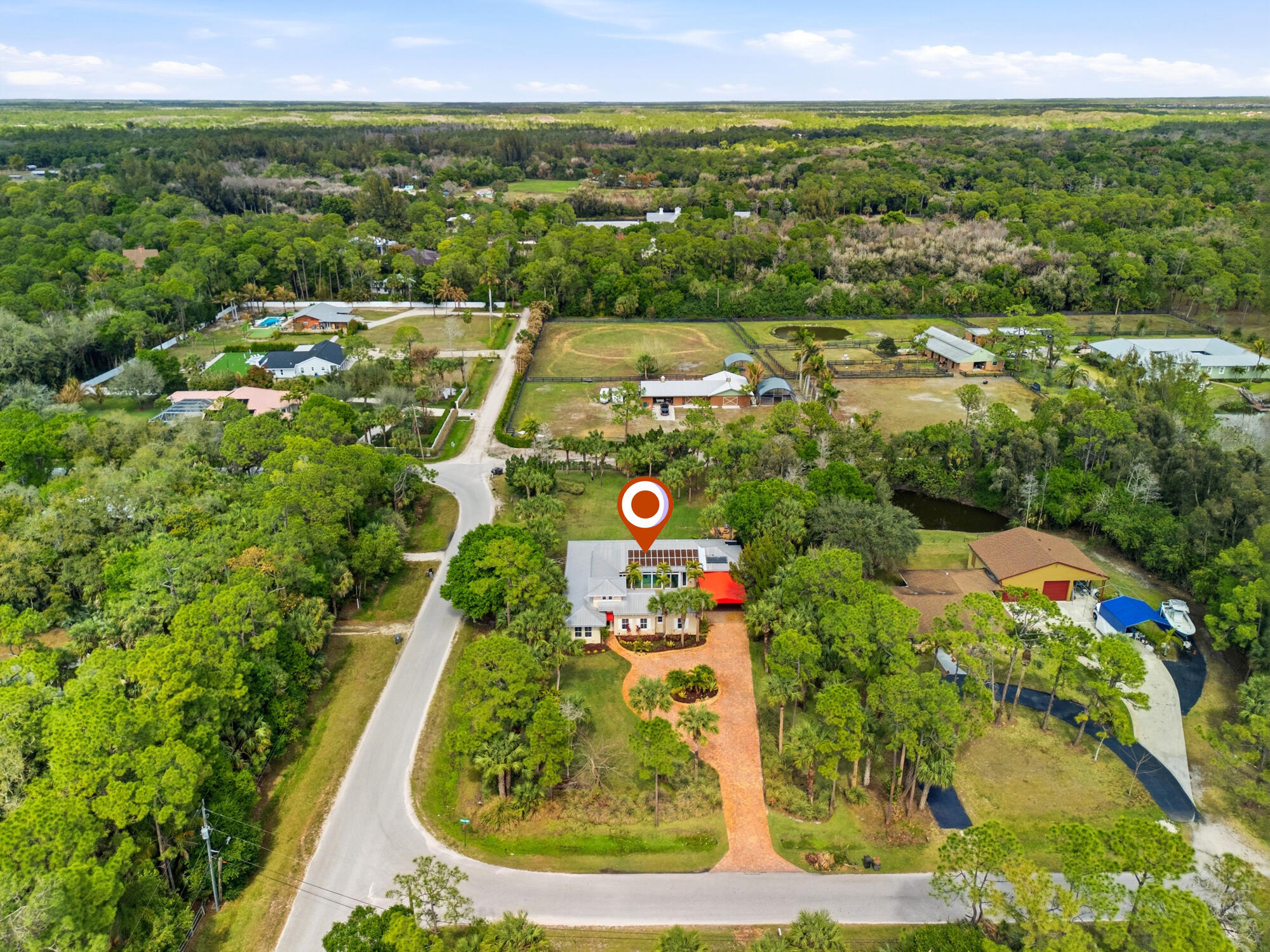 9483 166th Way North Jupiter, FL 33478 - Photo 40 of 48 53_dji_20260302125425_0014_d
