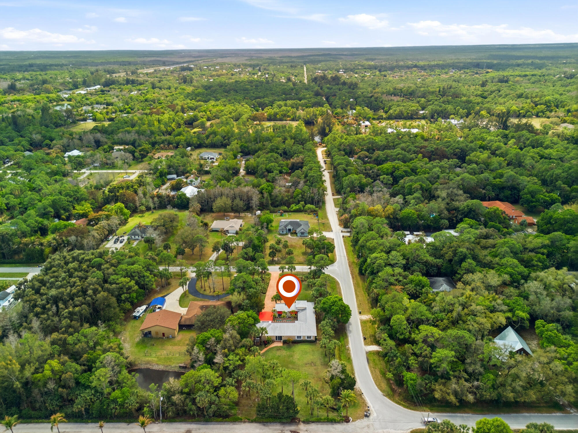 9483 166th Way North Jupiter, FL 33478 - Photo 41 of 48 56_dji_20260302125556_0029_d