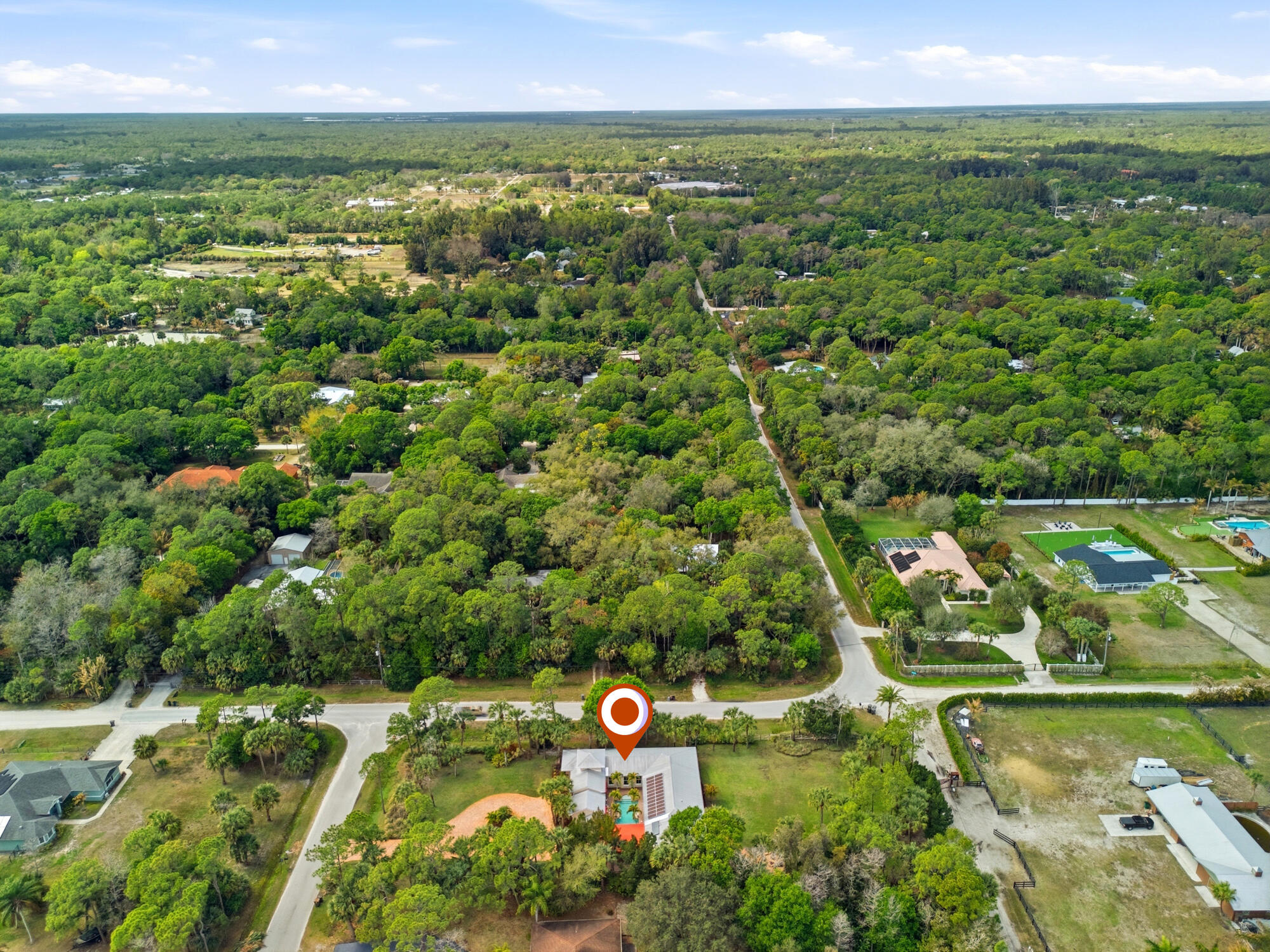 9483 166th Way North Jupiter, FL 33478 - Photo 42 of 48 57_dji_20260302125625_0034_d