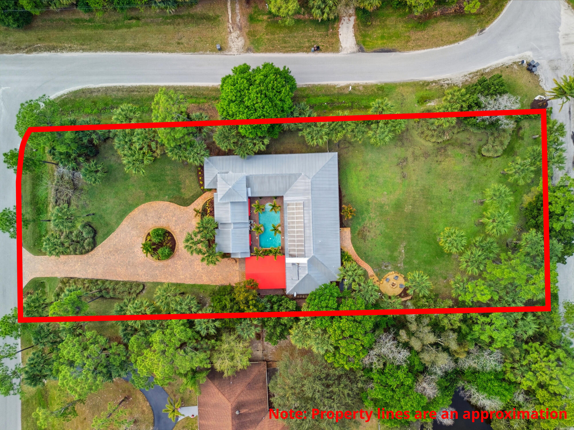 9483 166th Way North Jupiter, FL 33478 - Photo 43 of 48 58_dji_20260302125702_0039_d