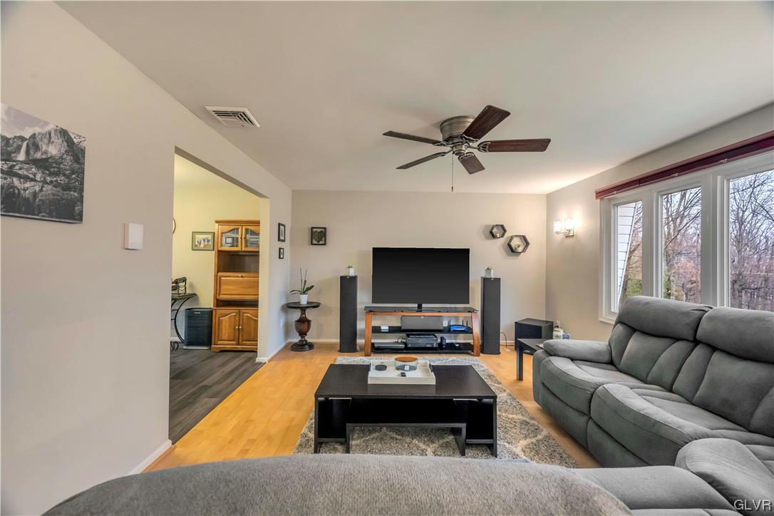 2559 Mountain Road Slatington, PA 18080 - Photo 11 of 32 a living room with furniture and a flat screen tv